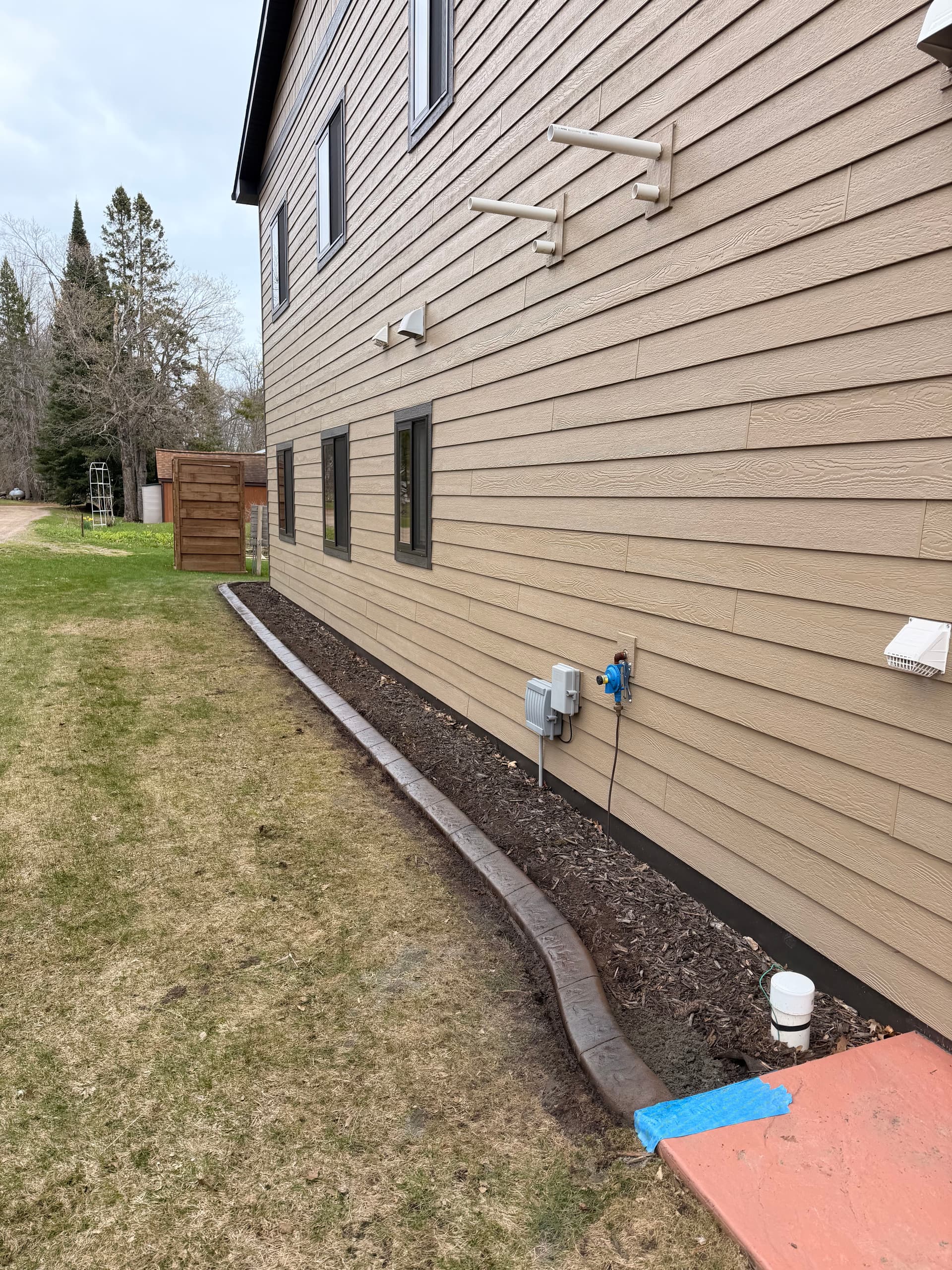 Gallery photos for Concrete Curbing With a Walnut and Charcoal Blend in Aitkin Minnesota: Image #1