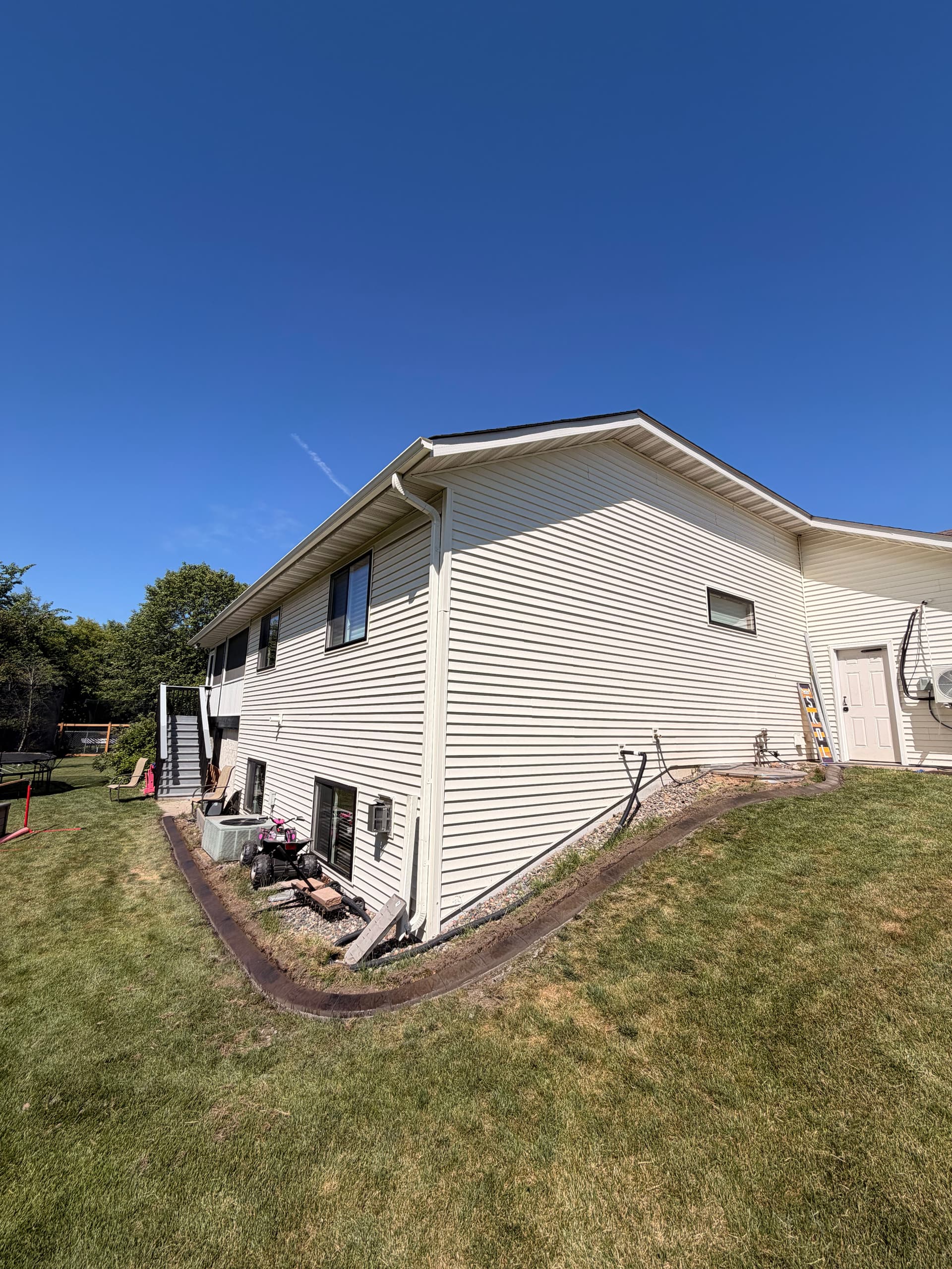 Gallery photos for Concrete Curbing in Walnut and Charcoal for Sauk Rapids Home: Image #2