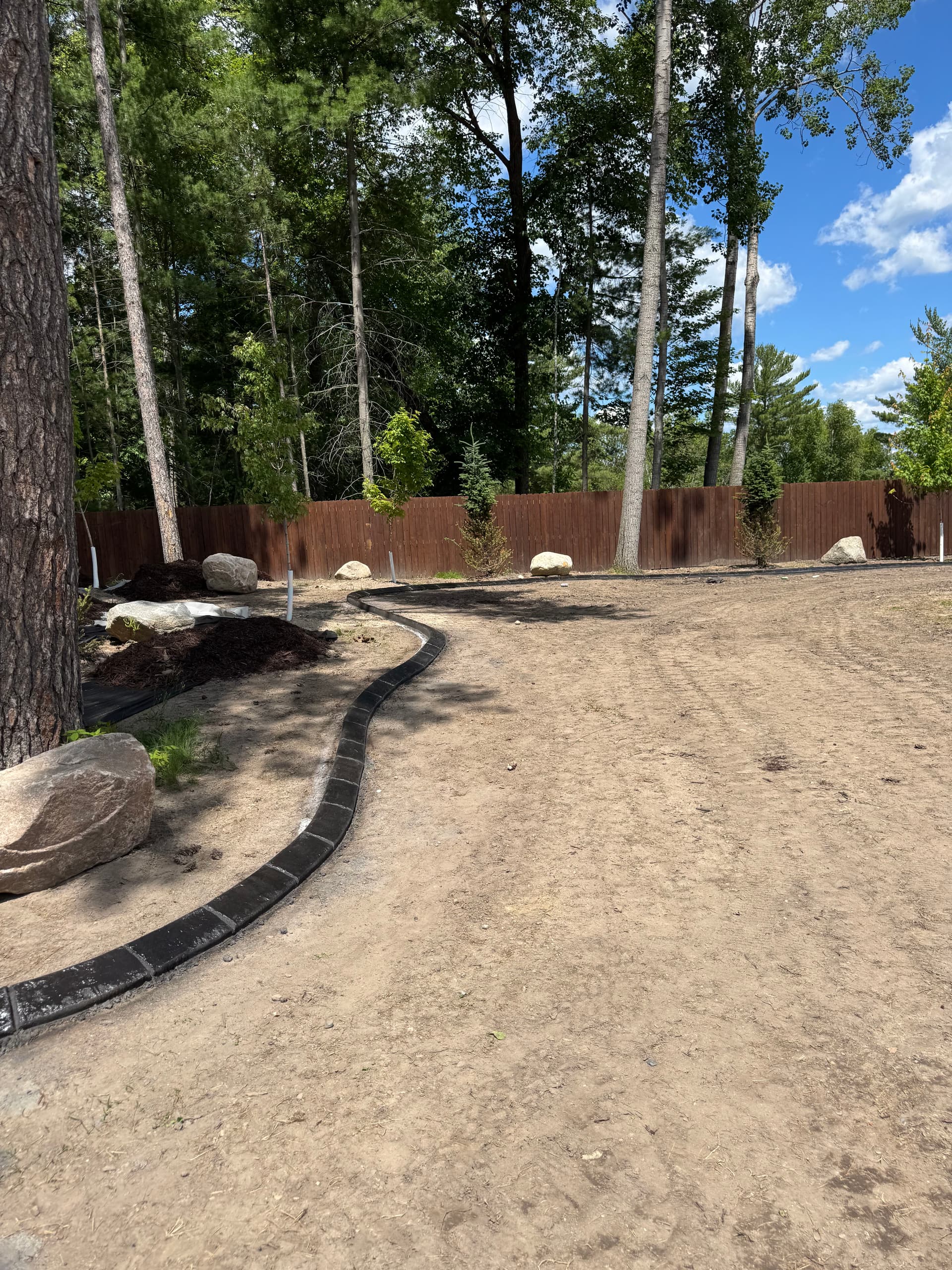 Concrete Curbing with Deep Charcoal Finish in Walker MN image