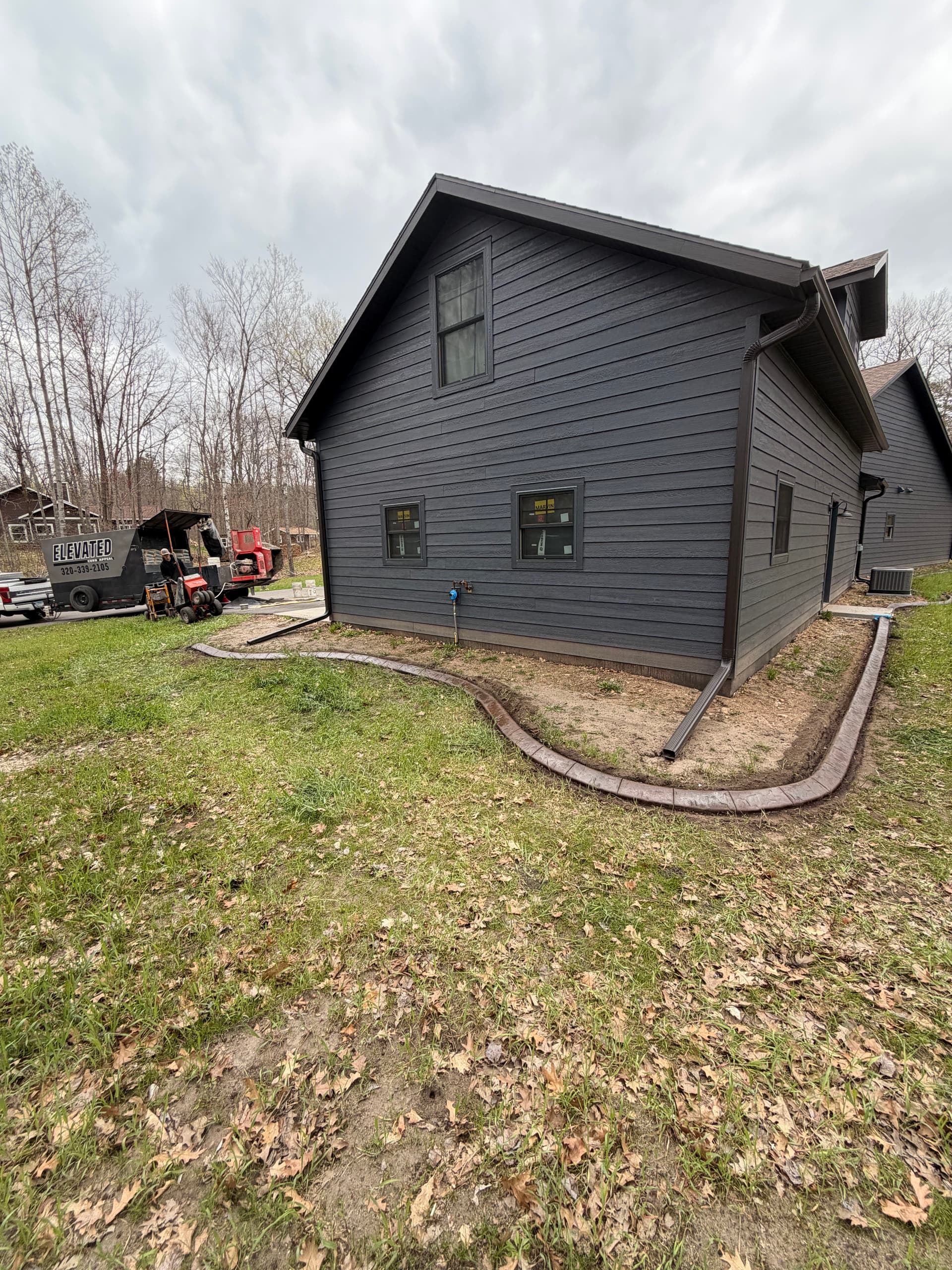 Gallery photos for Stamped Concrete Curb Wraps This Crosby Home Clean: Image #6