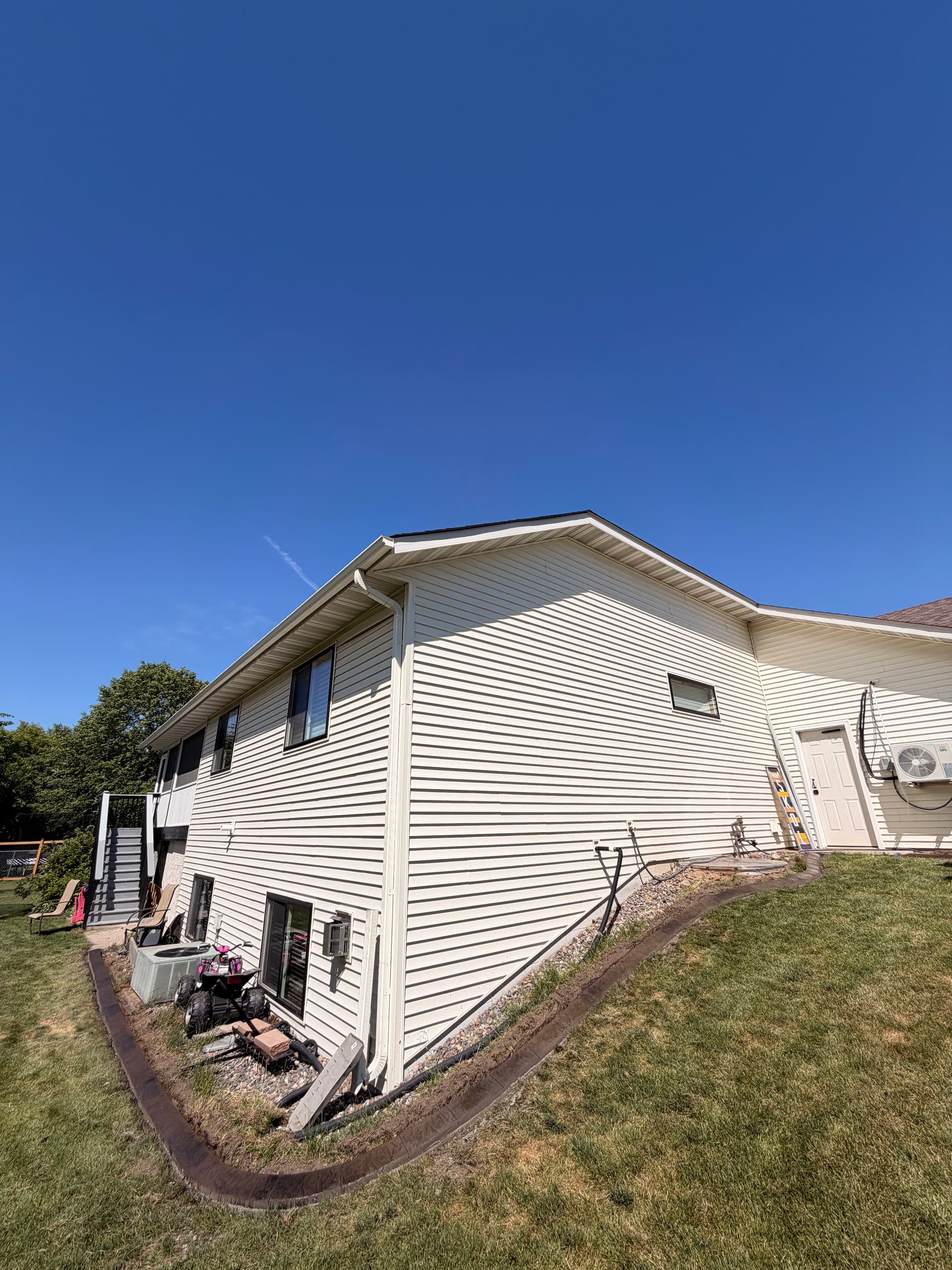 Gallery photos for Concrete Curbing in Walnut and Charcoal for Sauk Rapids Home: Image #1