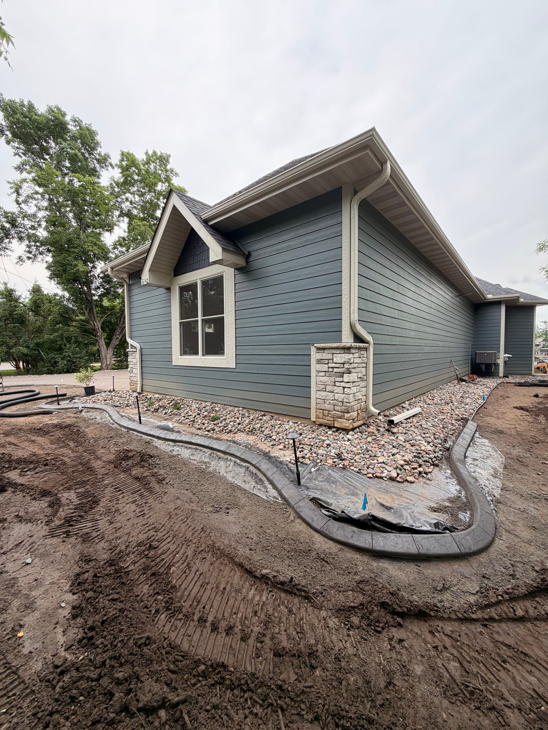 Gallery photos for Concrete Curbing with Charcoal Slate Stamp in Champlin: Image #2