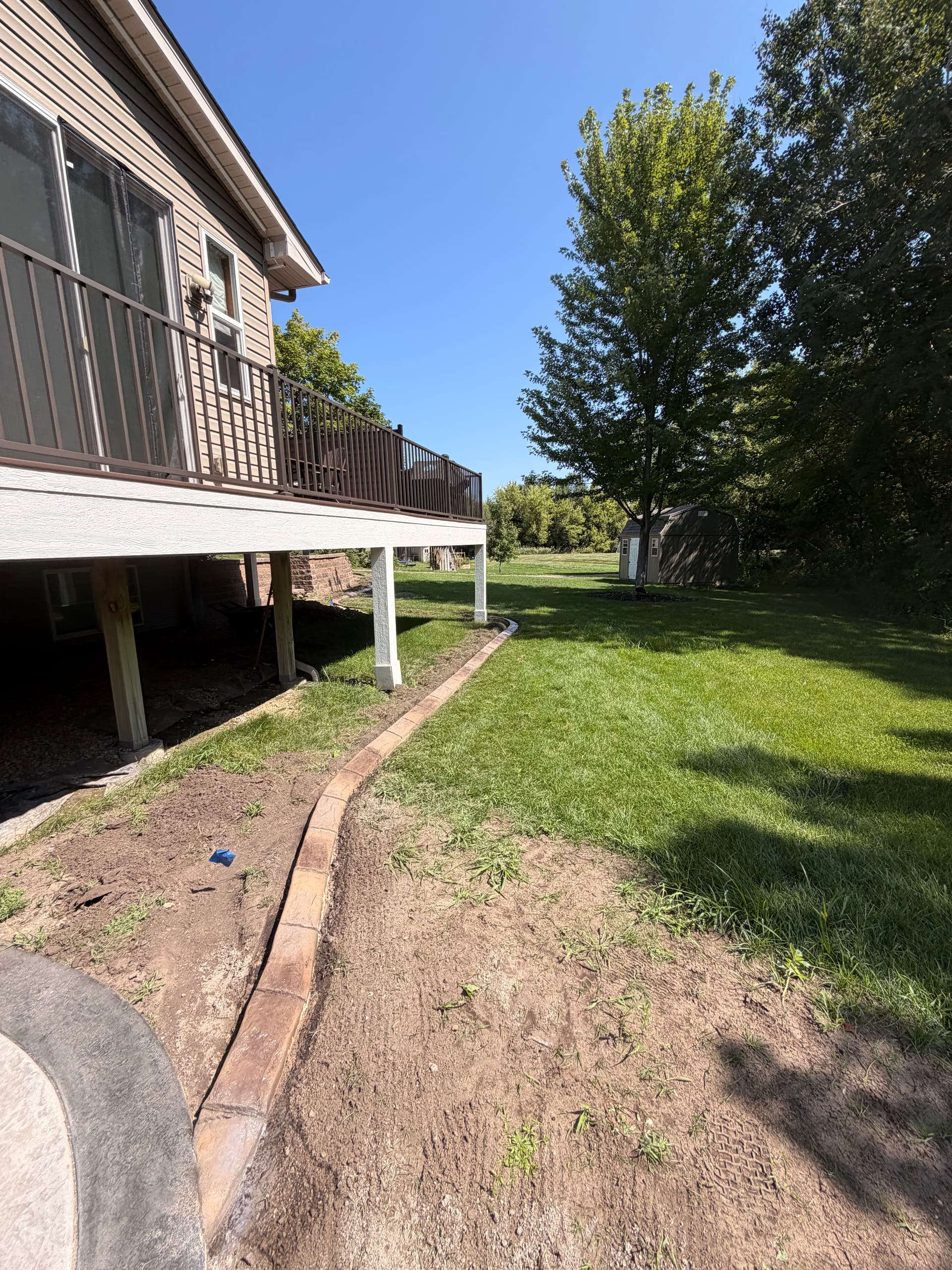 Gallery photos for Concrete Curbing Install Gives Otsego Landscape a Clean, Finished Edge: Image #7