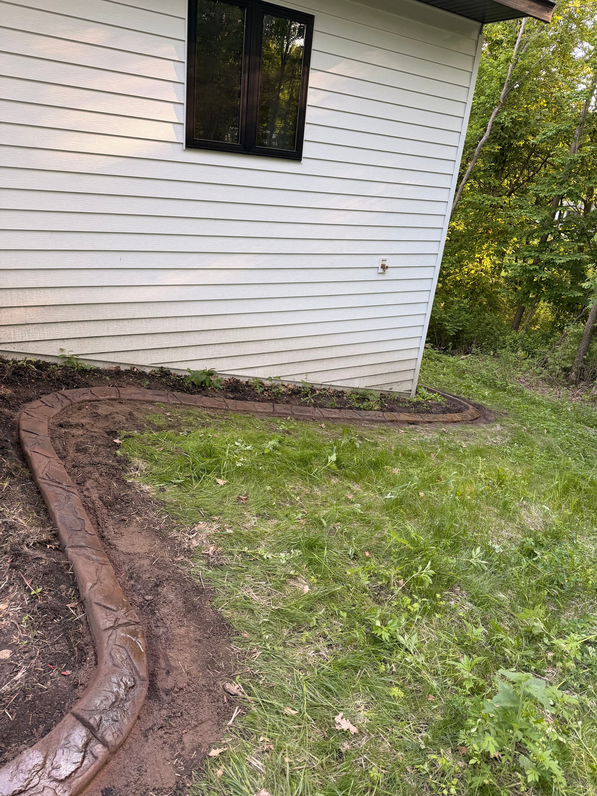 Gallery photos for Concrete Curbing with Granite Slate Stamp in Paynesville: Image #1