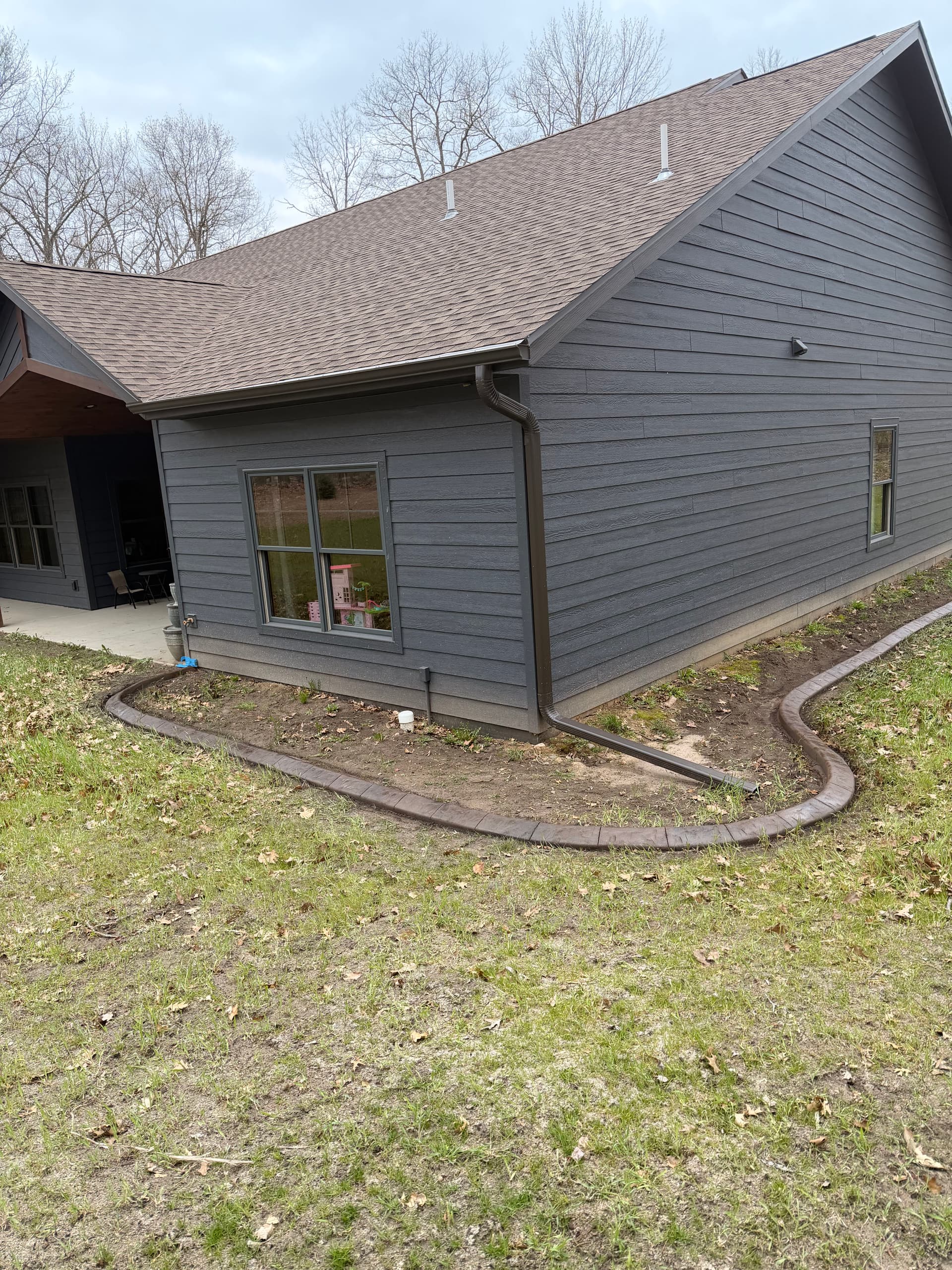 Gallery photos for Stamped Concrete Curb Wraps This Crosby Home Clean: Image #2
