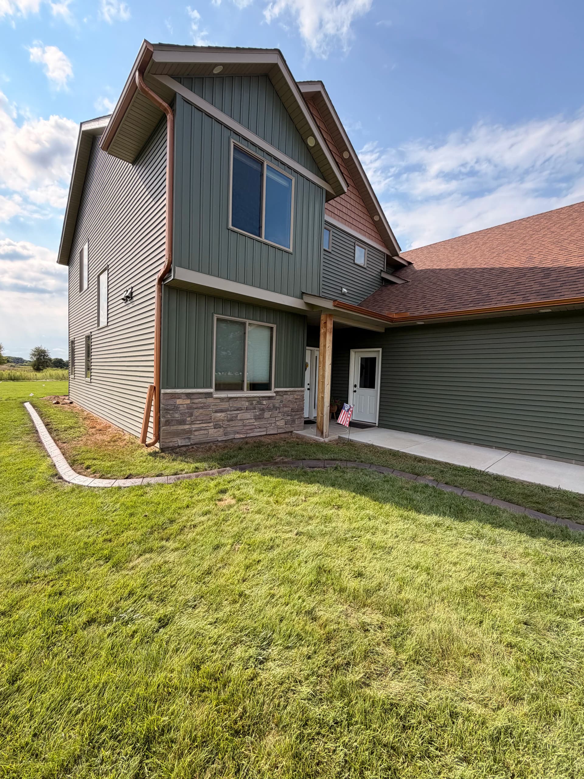 Gallery photos for Concrete Curbing Wraps This Princeton MN Property in Clean Definition: Image #2