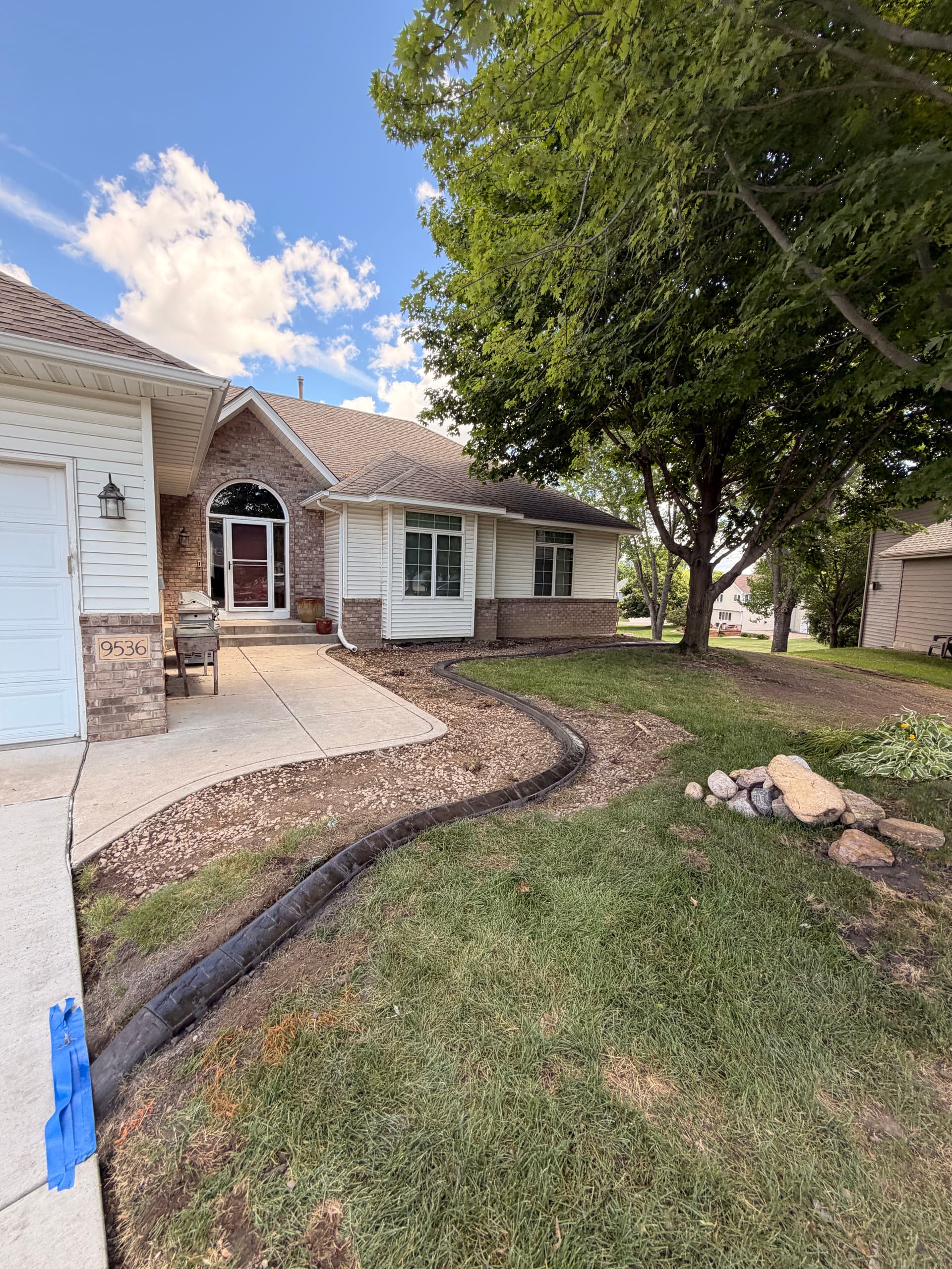 Concrete Curbing Install Gives Maple Grove Property a Polished Edge image