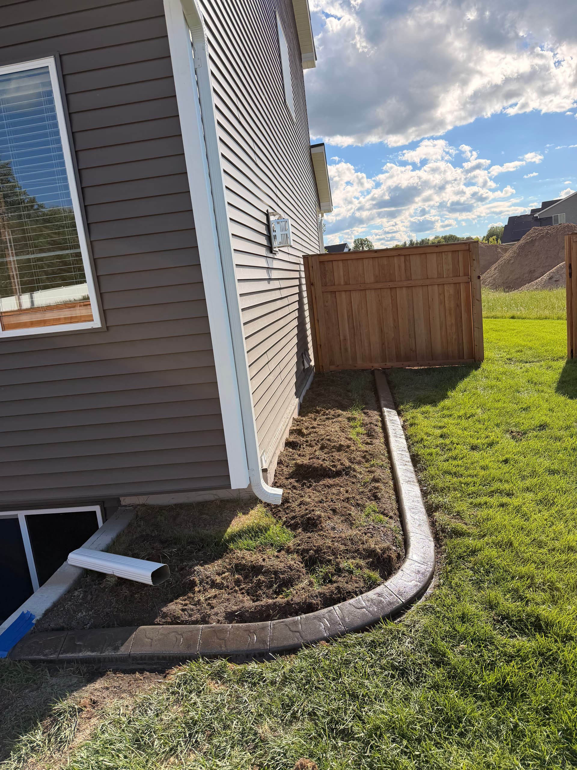 Gallery photos for Concrete Curbing Gives This Andover Home a Clean Finish: Image #2