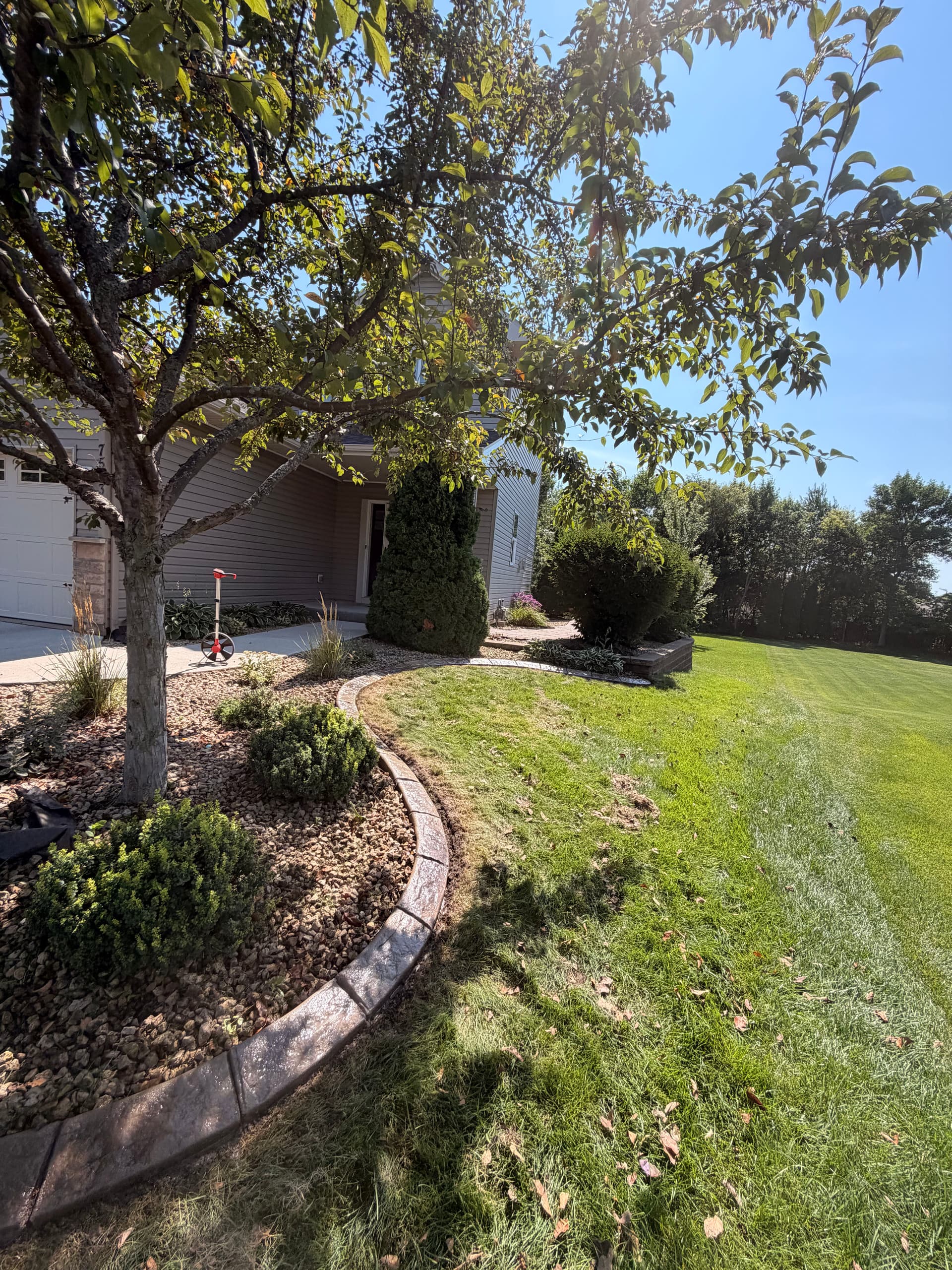 Gallery photos for Concrete Curbing Install Gives Otsego Landscape a Clean, Finished Edge: Image #1