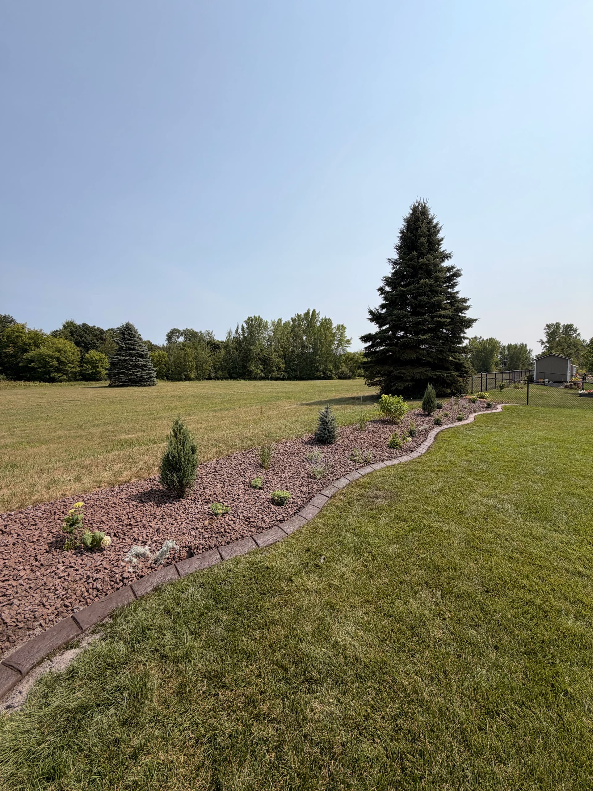 Concrete Curbing Gives Isanti Landscapes a Clean, Low-Maintenance Edge image