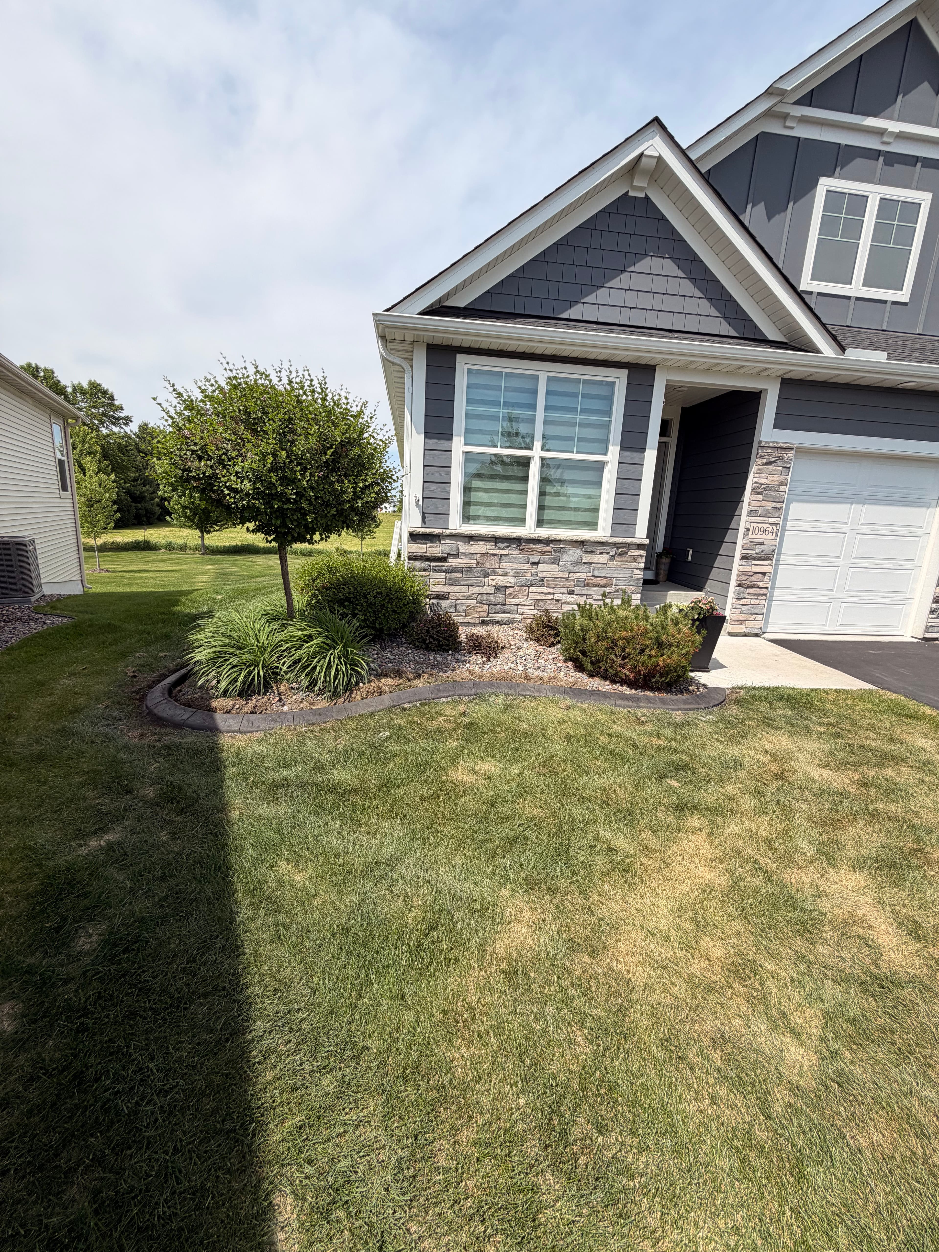 Project Concrete Curbing Upgrade Gives St. Michael Home Sharp, Clean Edges image