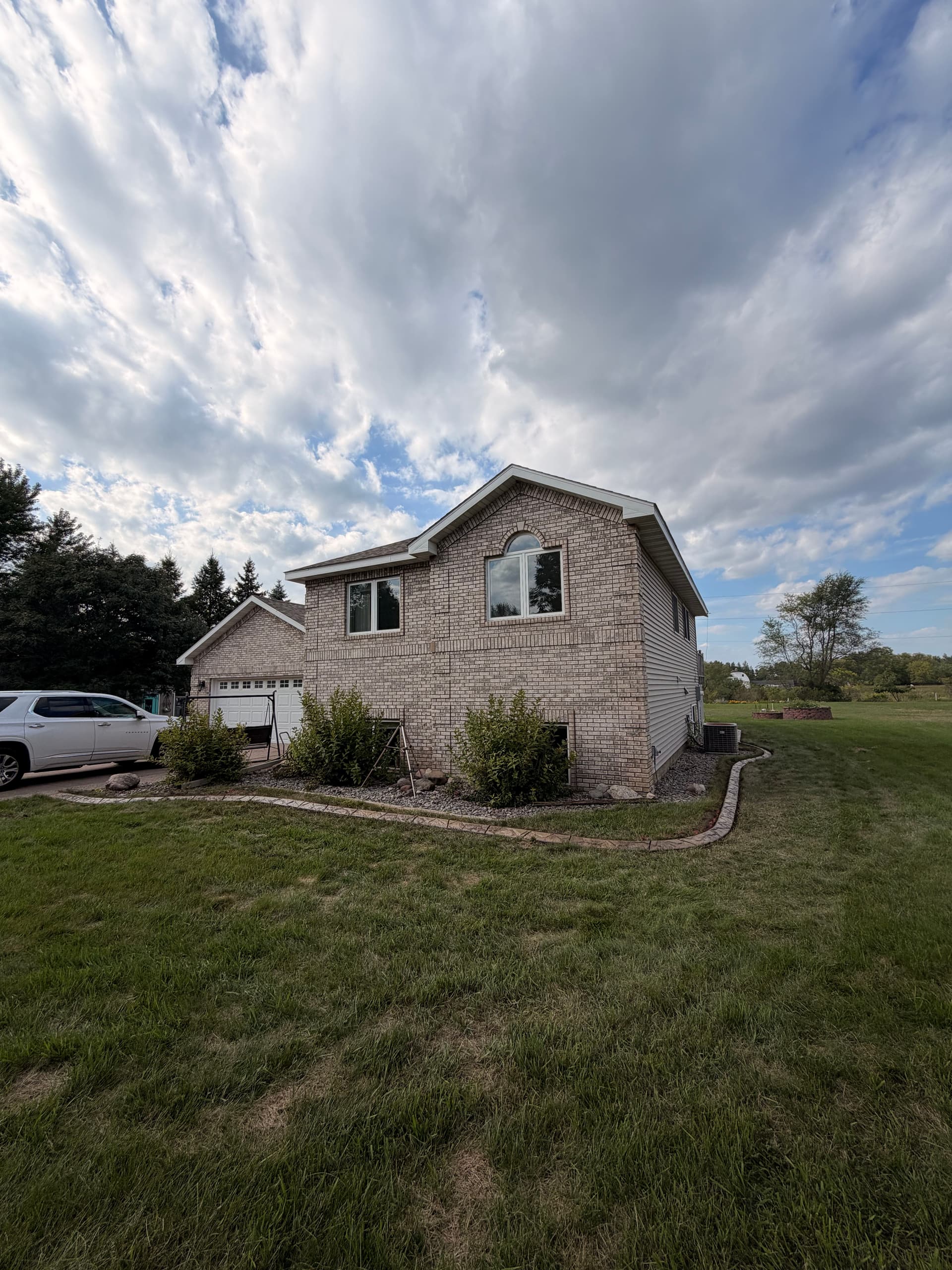 Concrete Landscape Curbing Gives St. Cloud Home a Sharp Edge image