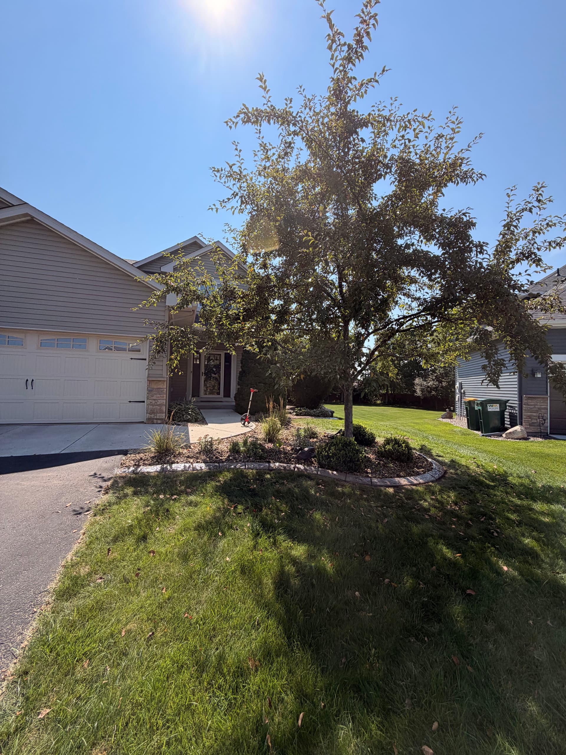 Concrete Curbing Install Gives Otsego Landscape a Clean, Finished Edge image