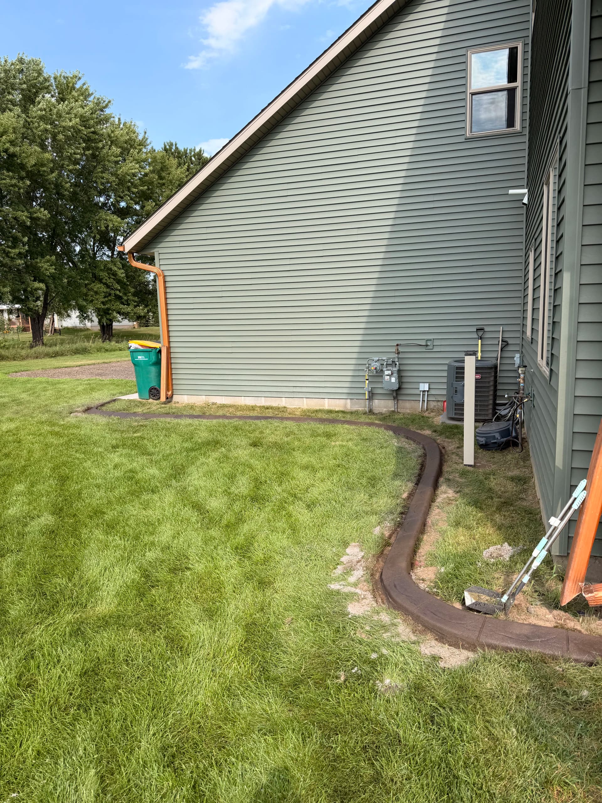 Gallery photos for Concrete Curbing Wraps This Princeton MN Property in Clean Definition: Image #3