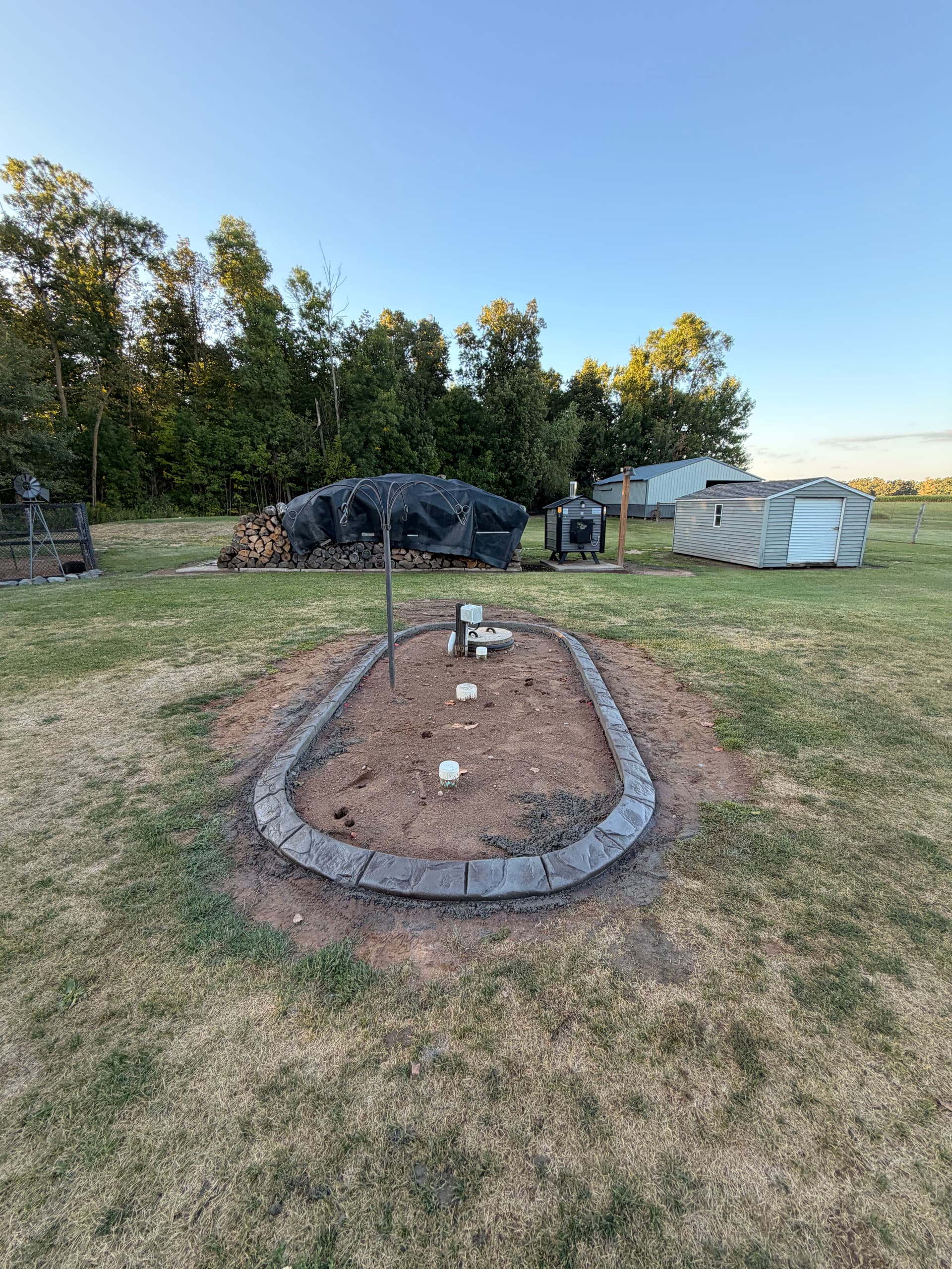 Gallery photos for Concrete Curbing Wraps a Pierz Minnesota Property With Clean Edges: Image #3