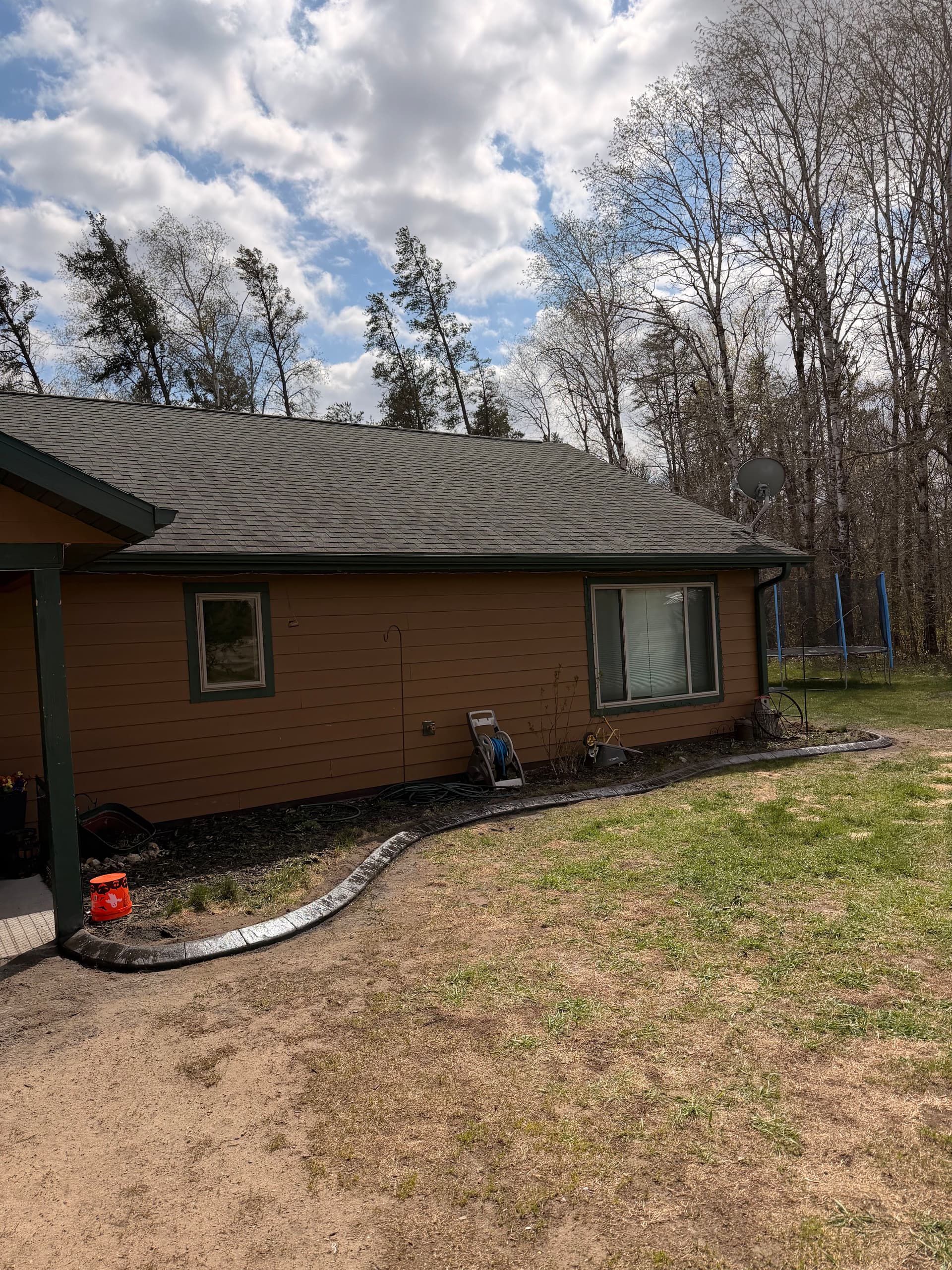 Gallery photos for Charcoal Concrete Curbing Replaces Boulder Edging in Motley MN: Image #2