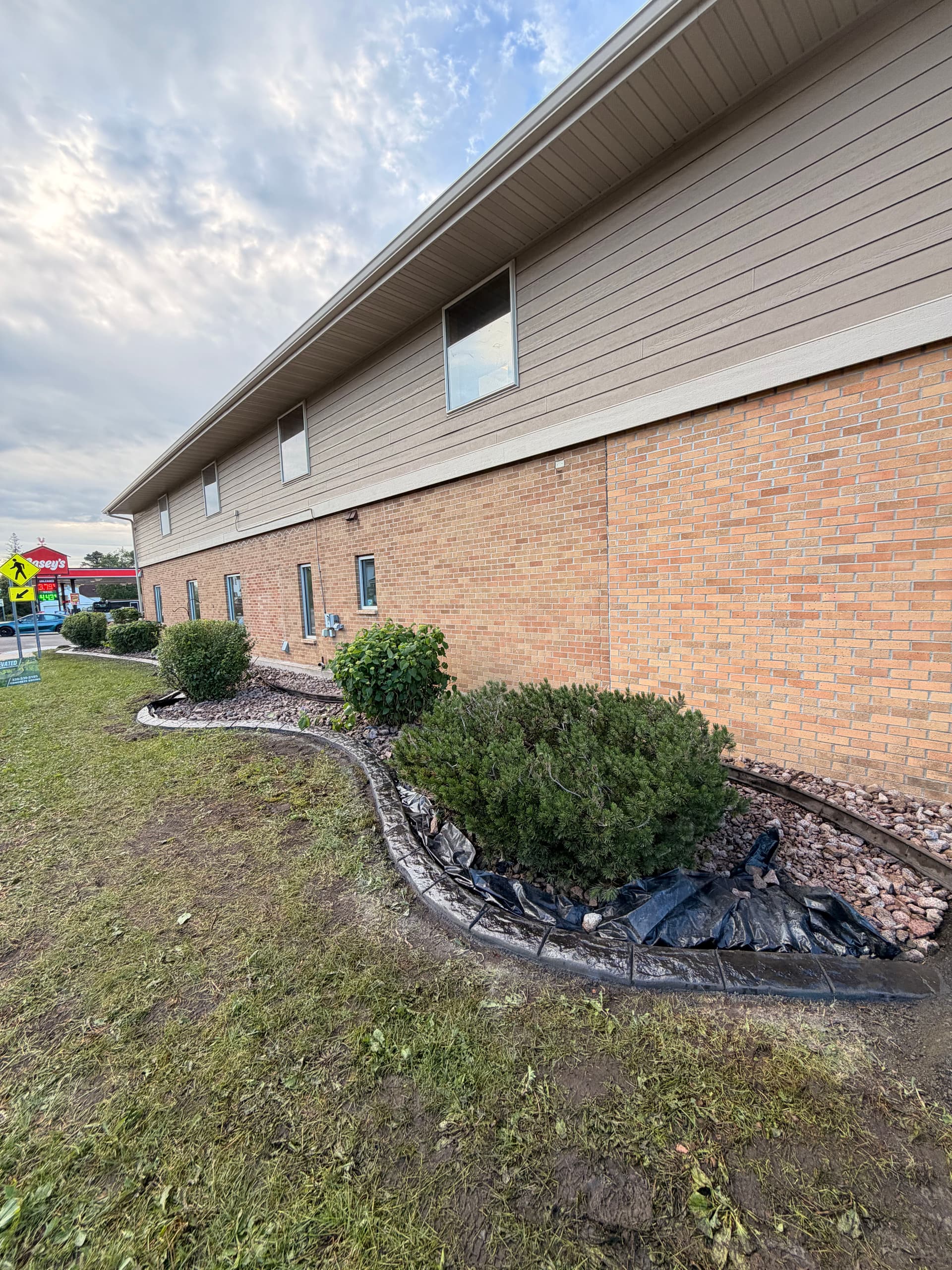 Concrete Curbing Install at Frandsen Bank and Trust in Foley image