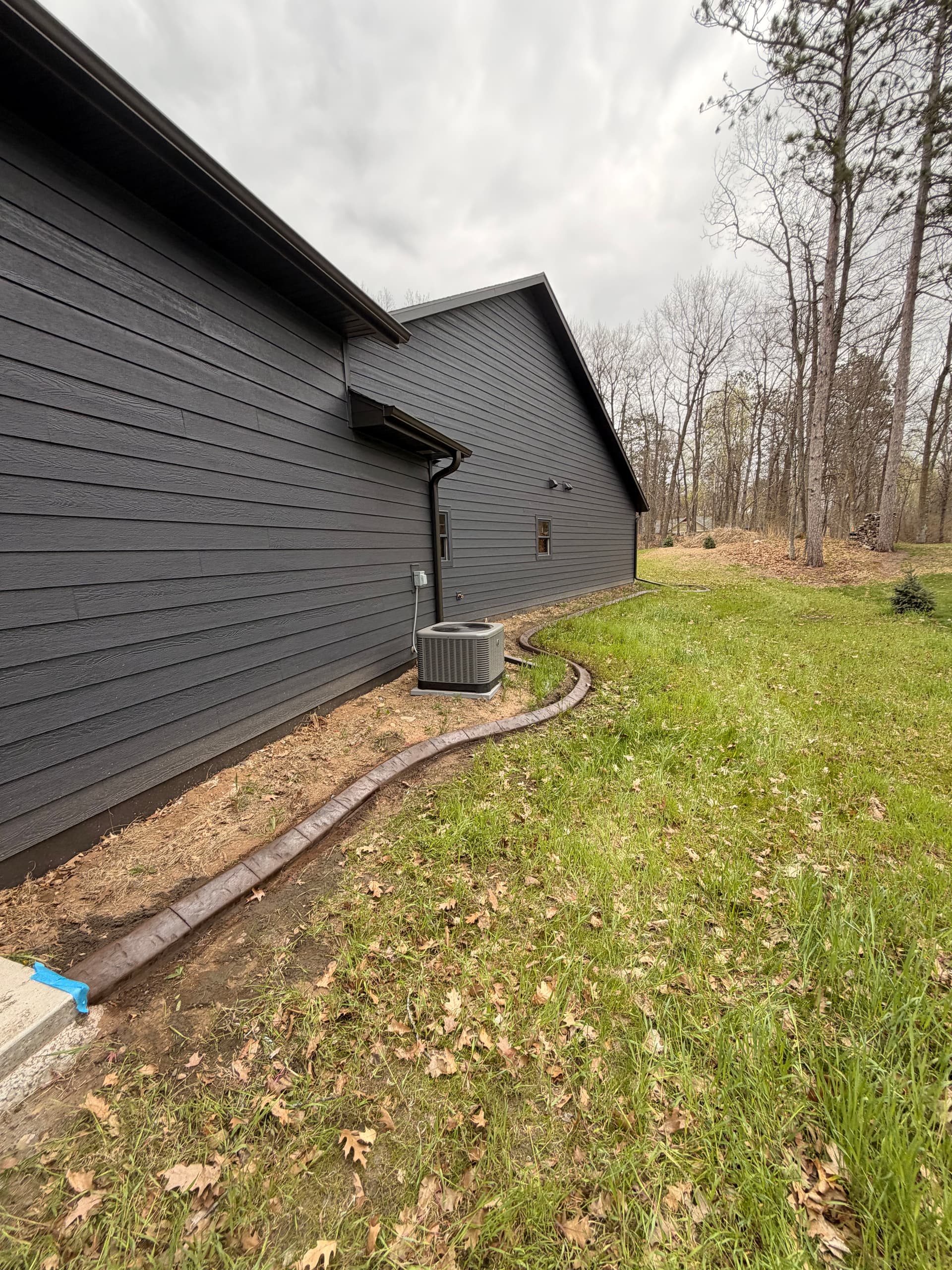 Gallery photos for Stamped Concrete Curb Wraps This Crosby Home Clean: Image #4