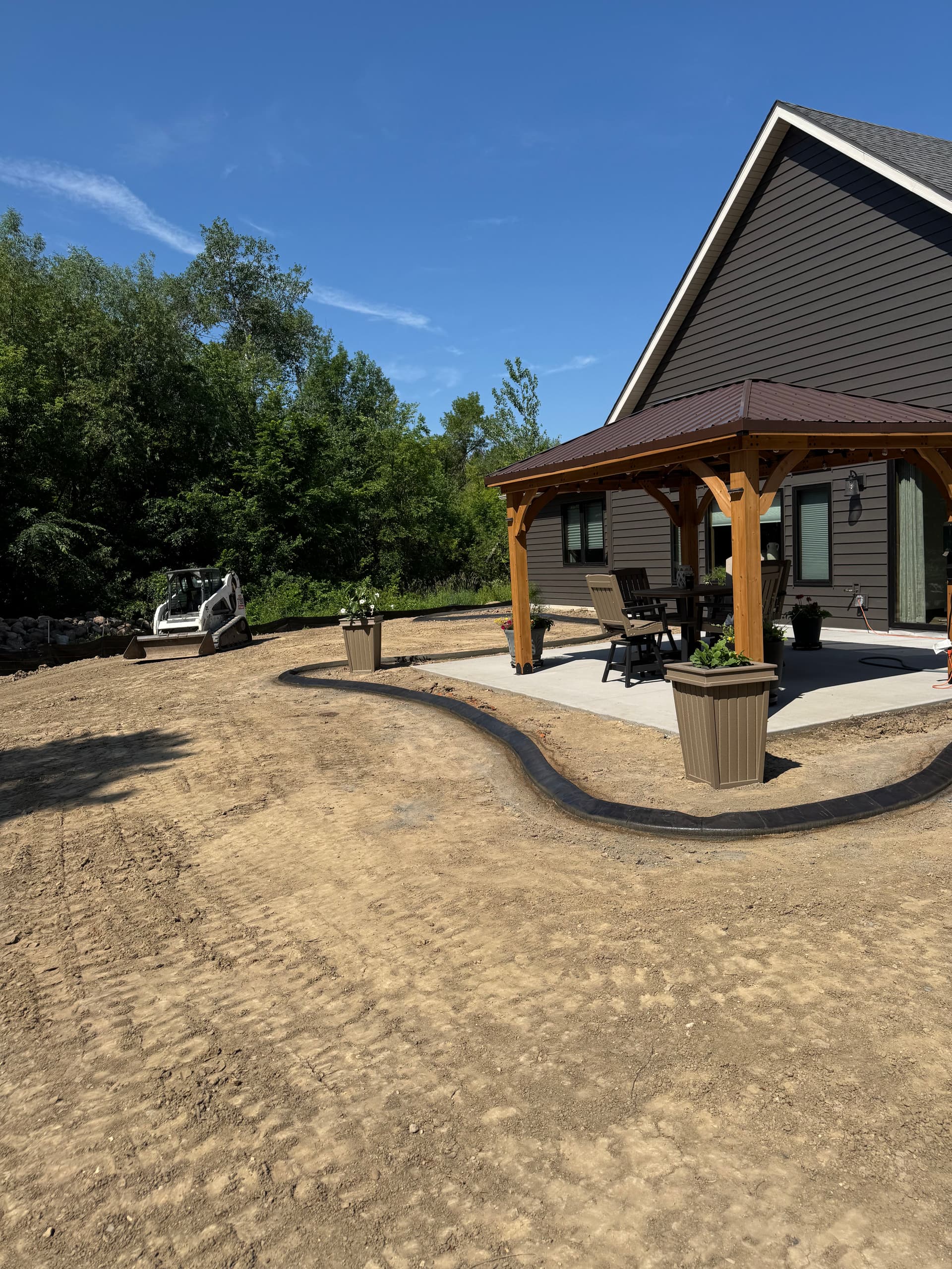 Gallery photos for Concrete Curbing With a Deep Charcoal Slate Stamp in Rogers: Image #3