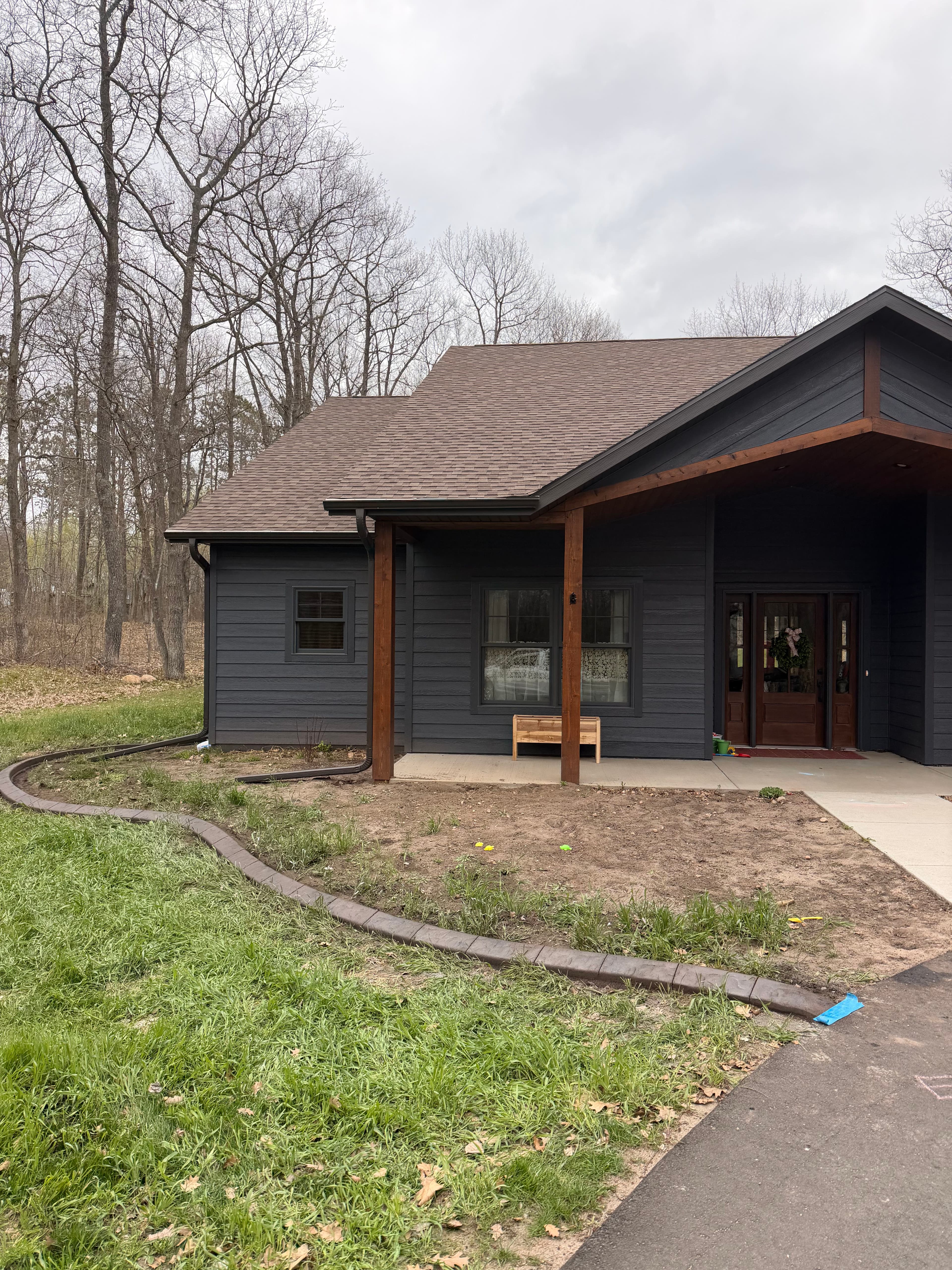 Project Stamped Concrete Curb Wraps This Crosby Home Clean image