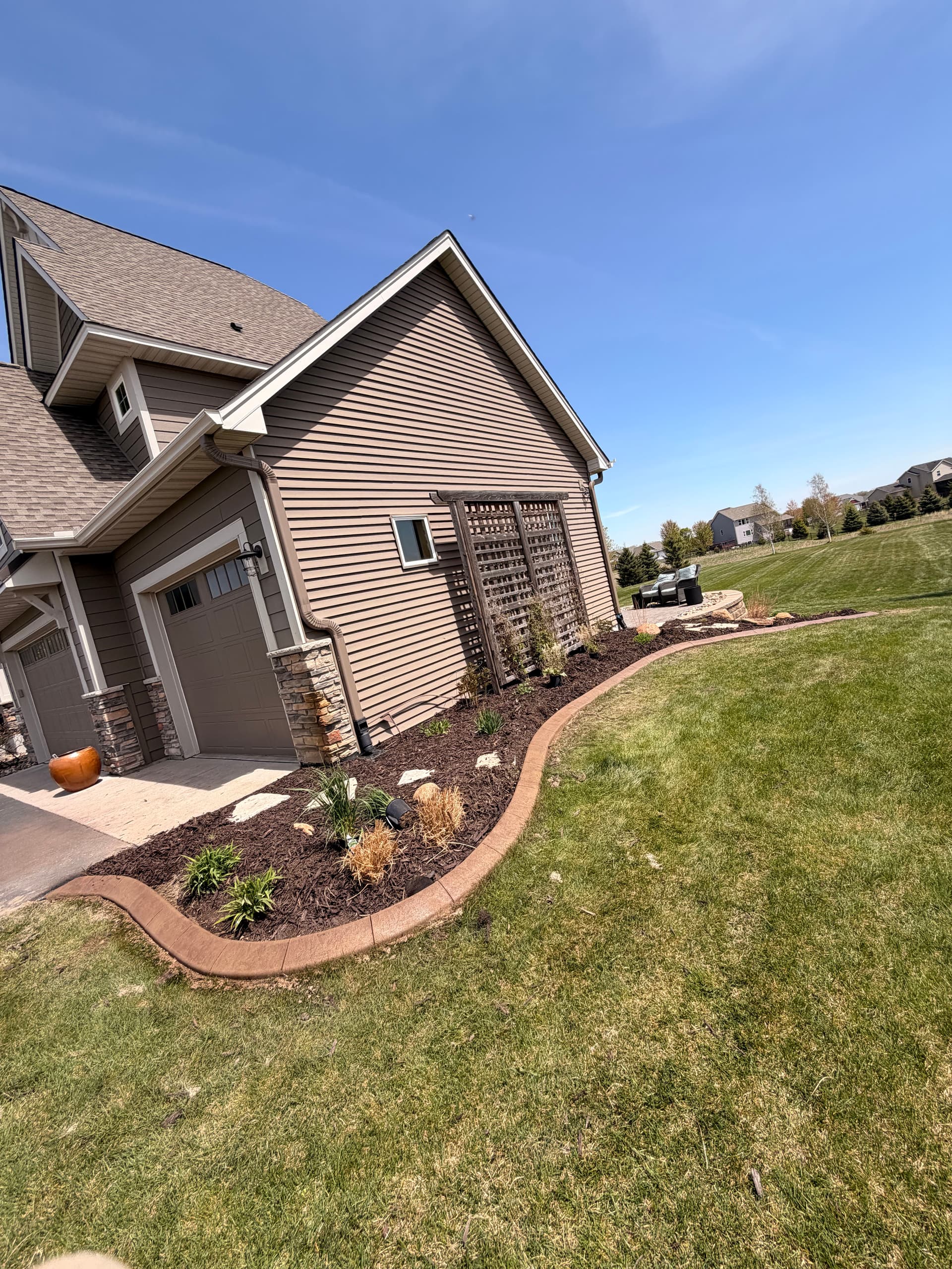 Gallery photos for Stamped Concrete Edging and Curb Appeal Done Right in Otsego: Image #4