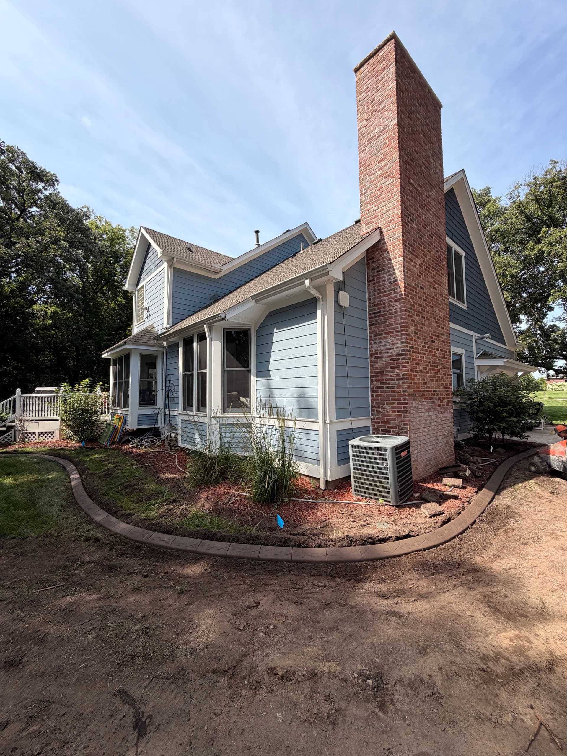 Decorative Concrete Curbing Gives Ramsey MN Yard a Sharper Look image