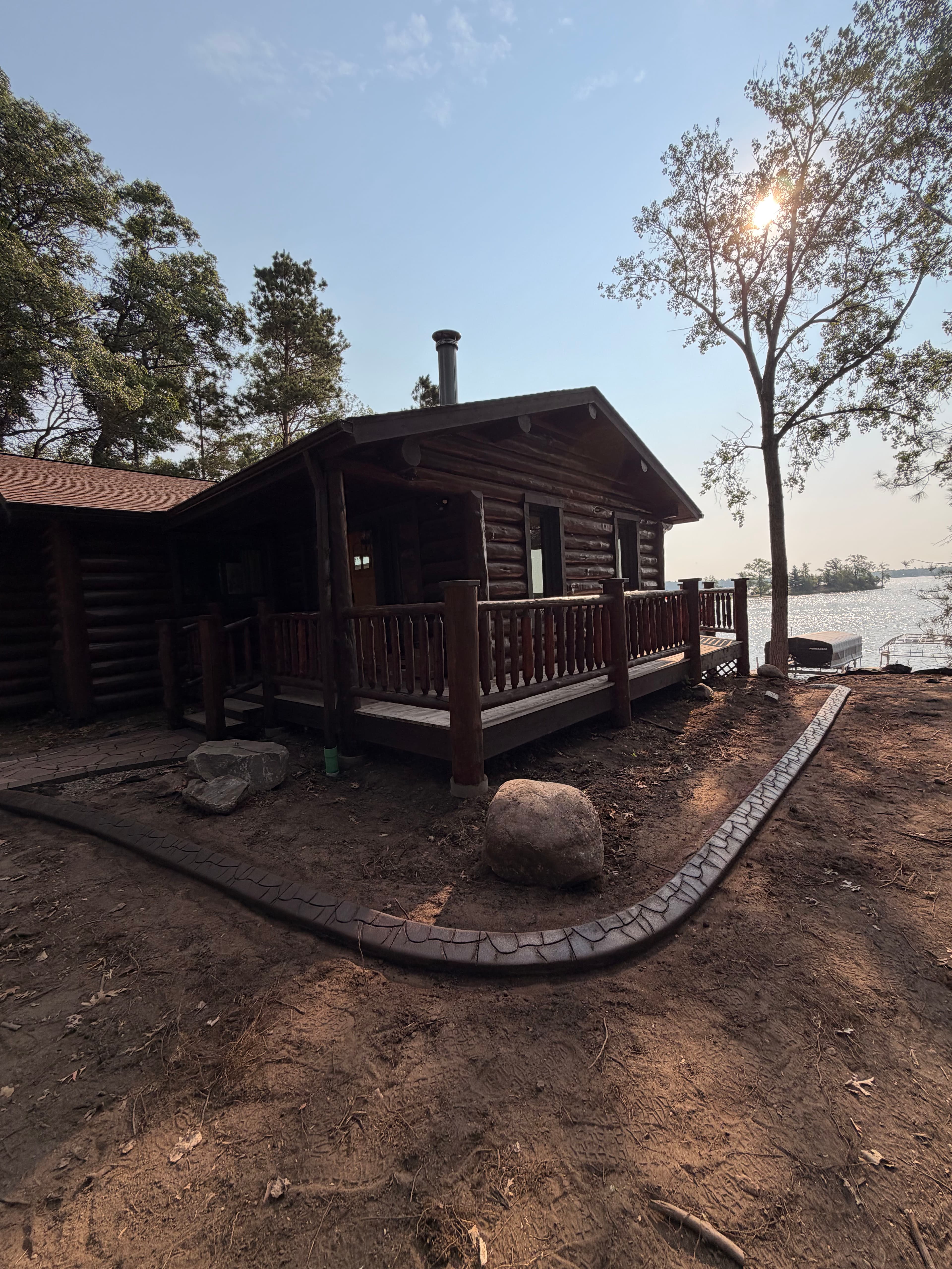 Project Concrete Curb Edging Gives This Cross Lake Cabin a Sharper Look image