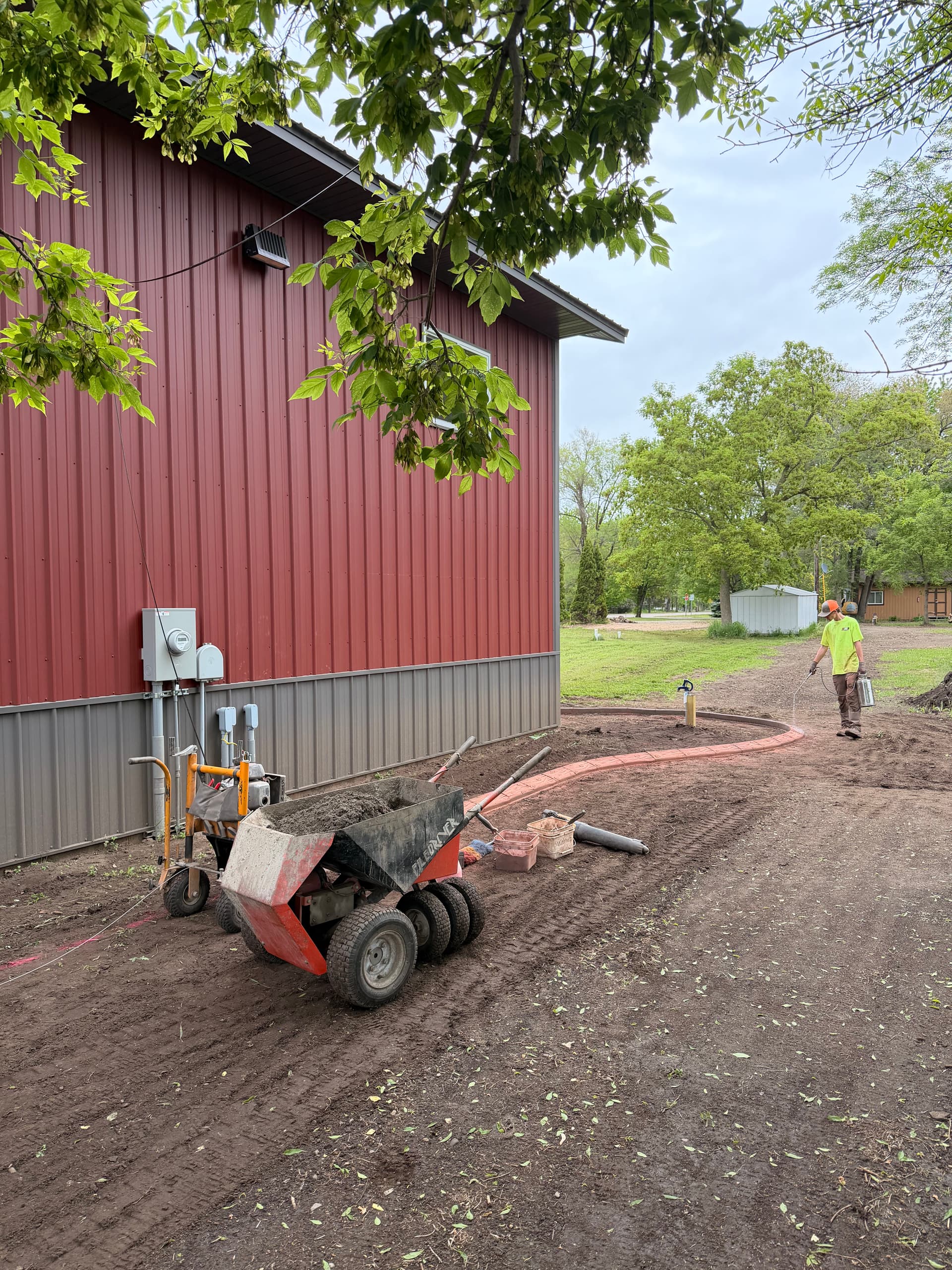 Gallery photos for Stamped Concrete Curbing Wraps a Building in Fairhaven MN: Image #3