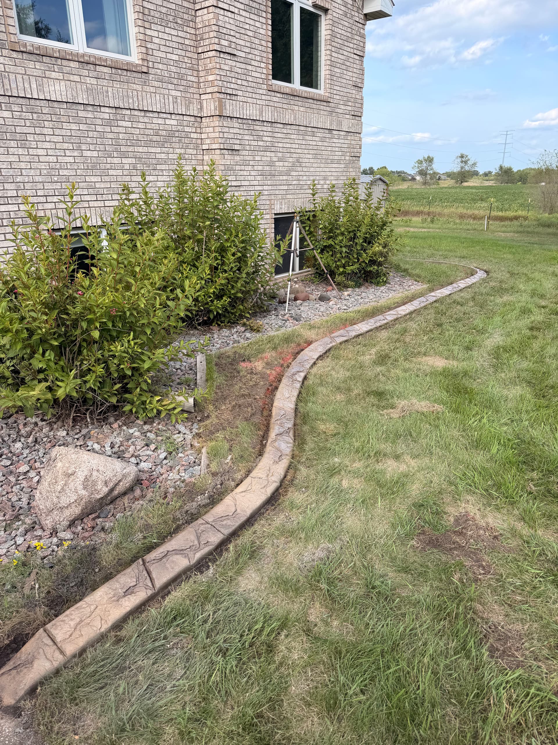 Gallery photos for Concrete Landscape Curbing Gives St. Cloud Home a Sharp Edge: Image #1