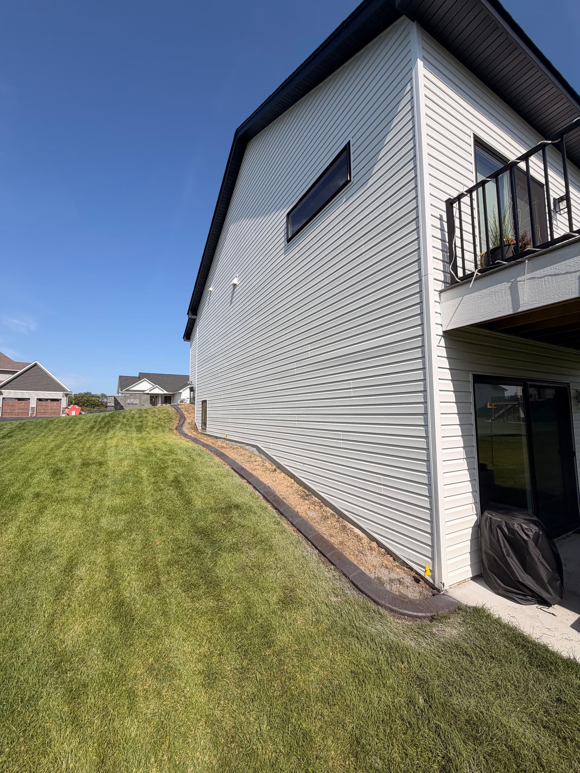 Gallery photos for Concrete Curbing Gives This Delano MN Home Sharp, Defined Edges: Image #1