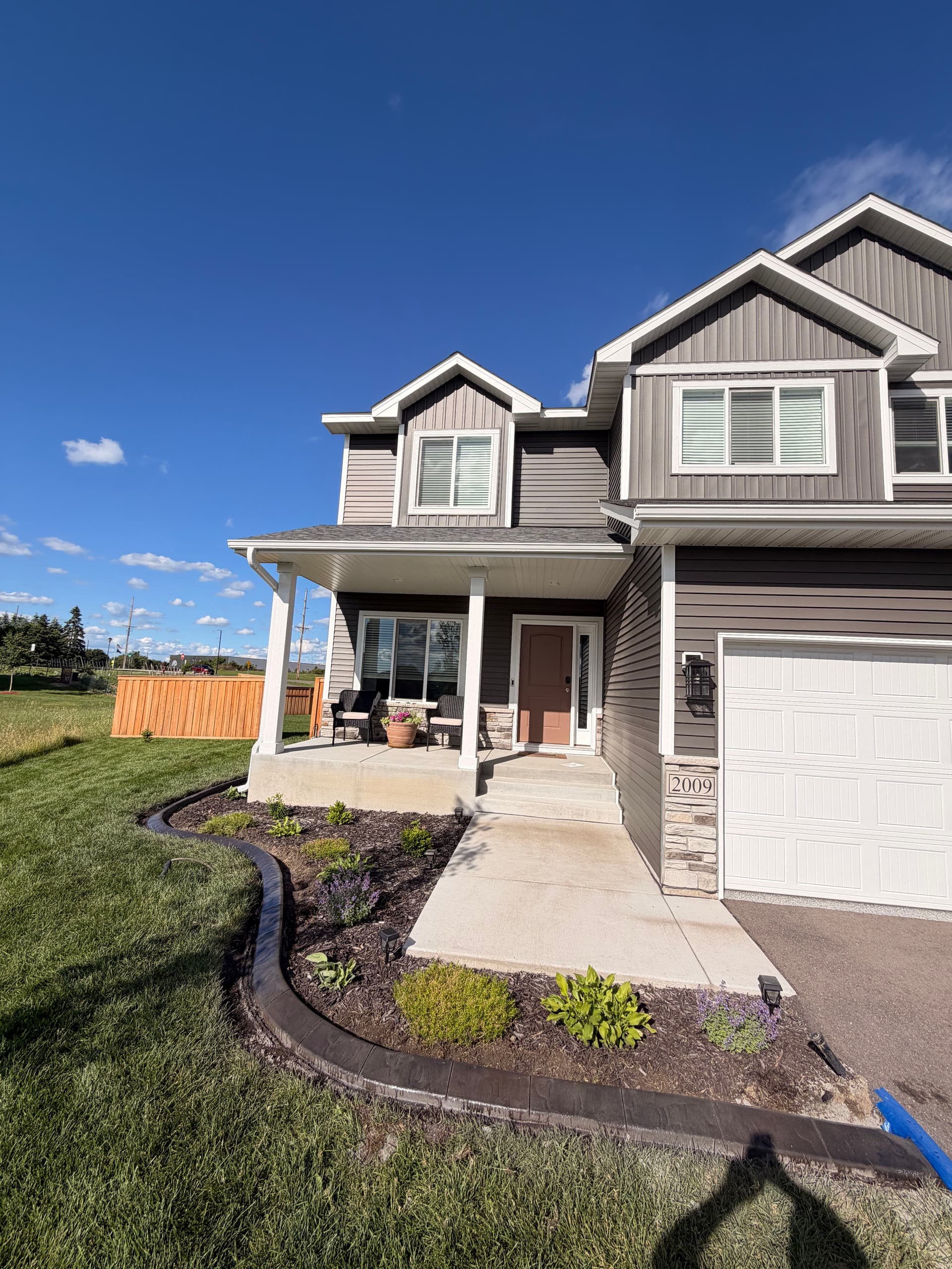 Concrete Curbing Gives This Andover Home a Clean Finish image