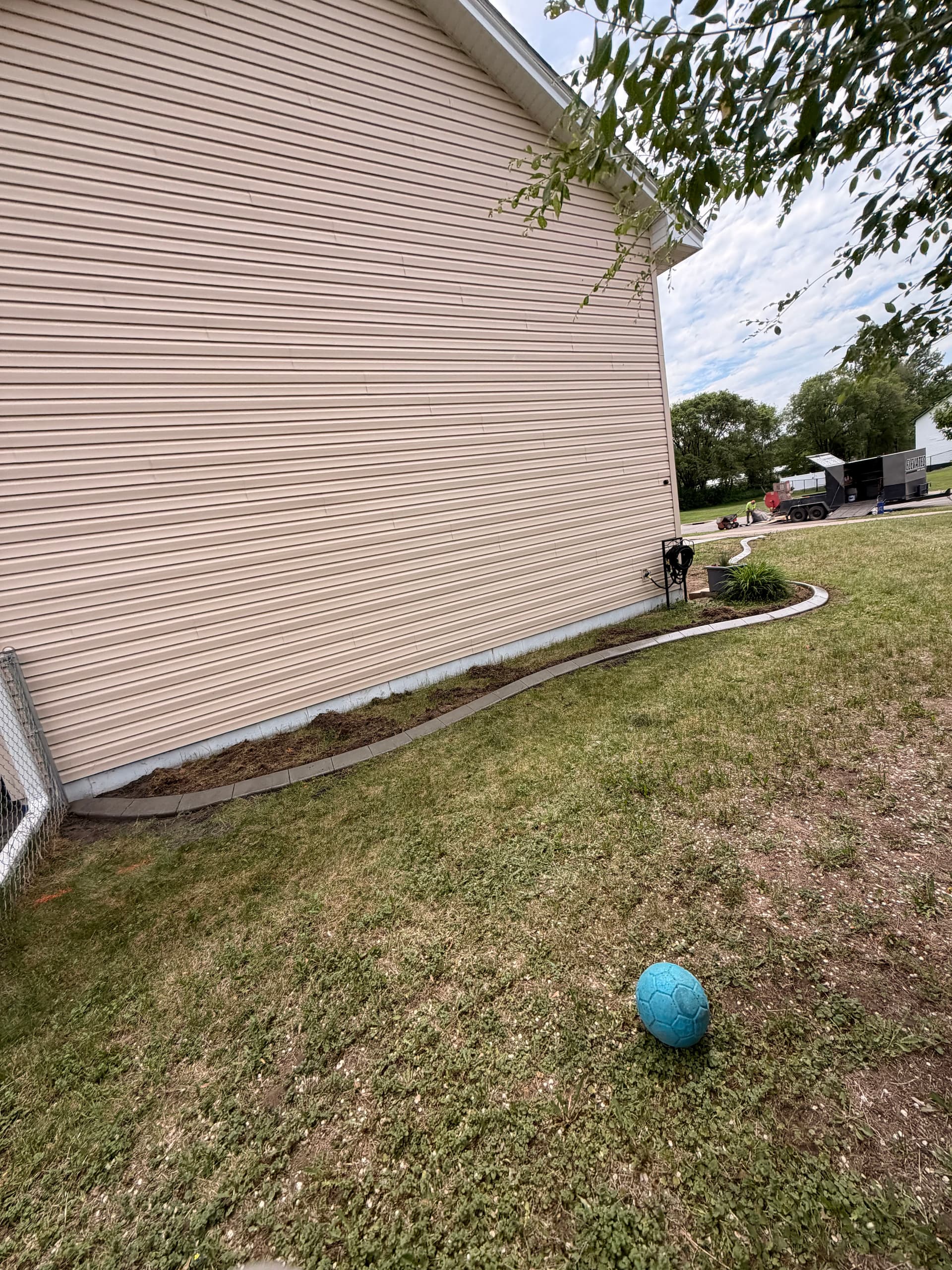 Gallery photos for Natural Concrete Curbing Gives Big Lake Home a Crisp Edge: Image #1