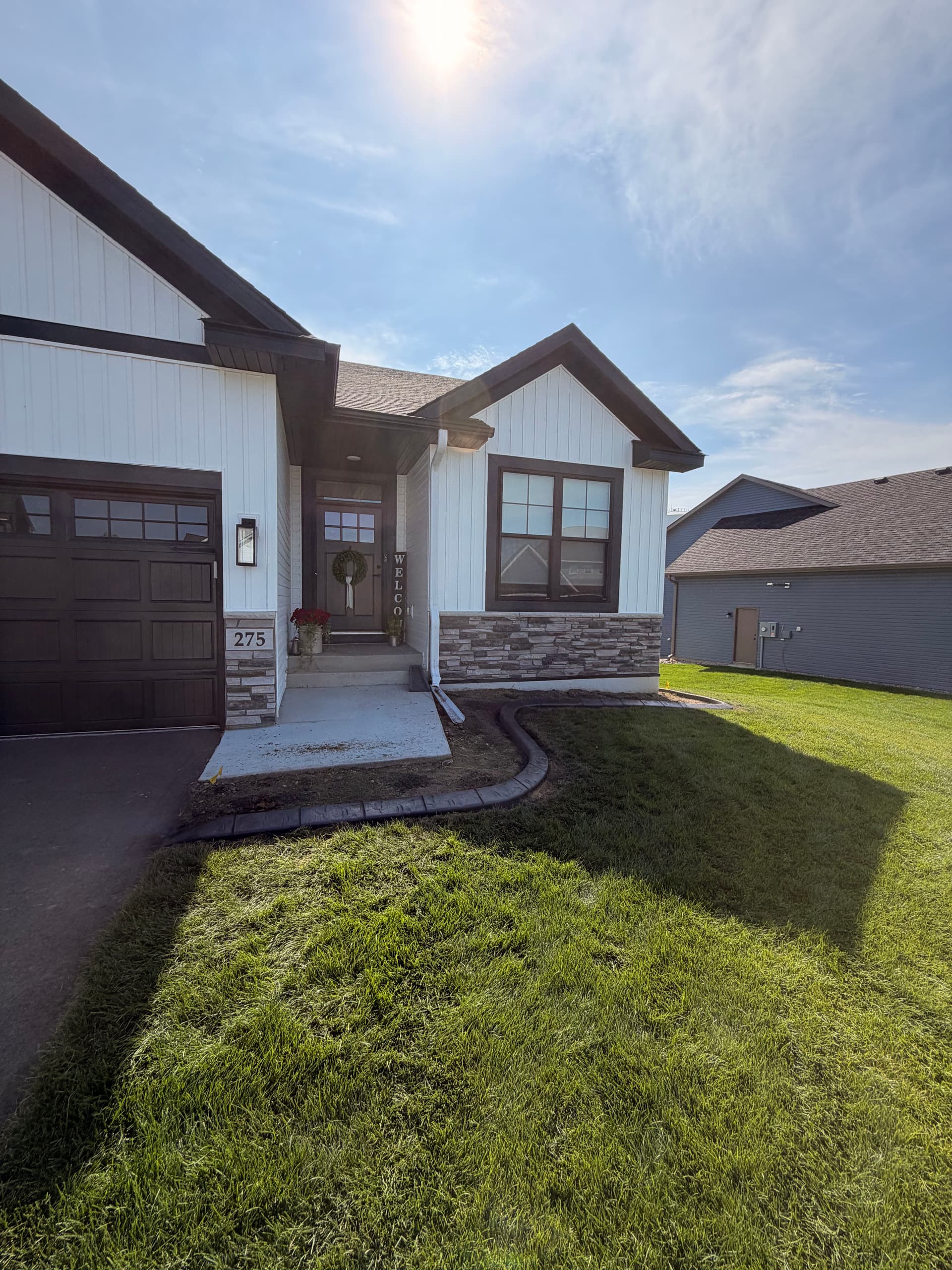 Concrete Curbing Gives This Delano MN Home Sharp, Defined Edges image