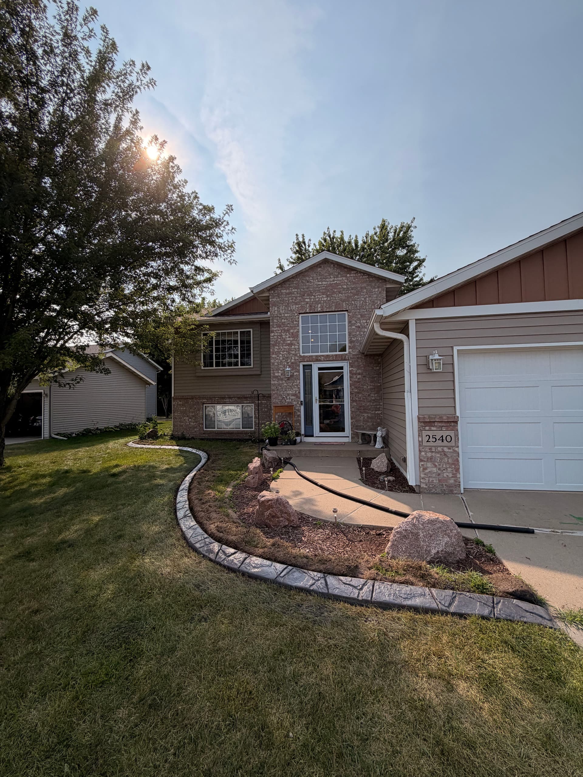 Concrete Curbing in Sauk Rapids Keeps Beds Sharp and Low Maintenance image
