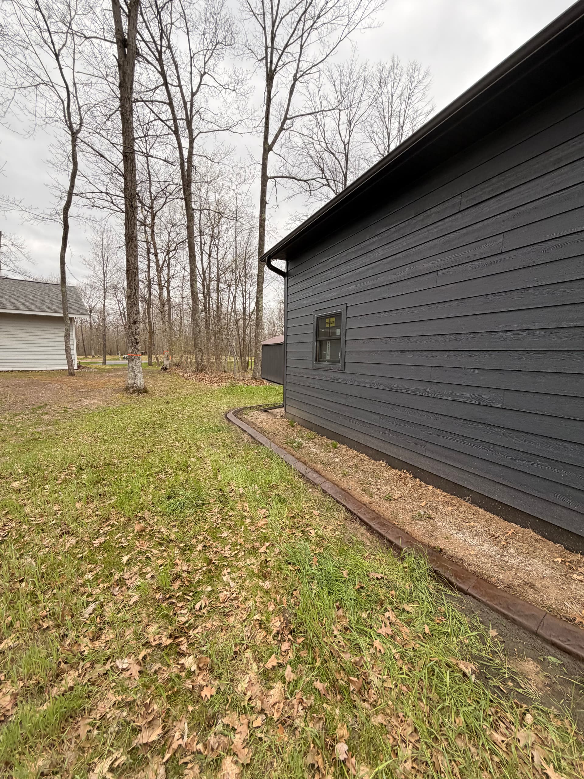 Gallery photos for Stamped Concrete Curb Wraps This Crosby Home Clean: Image #5