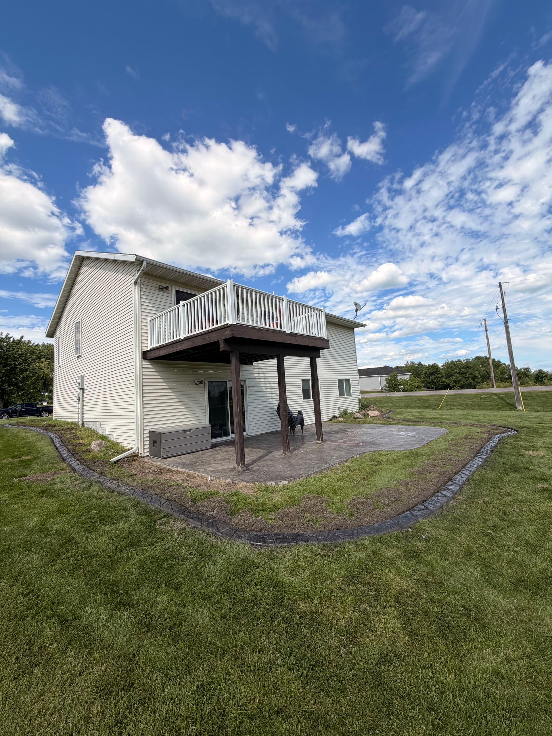 Gallery photos for Concrete Curbing with Granite Slate Stamp in Albany MN: Image #2