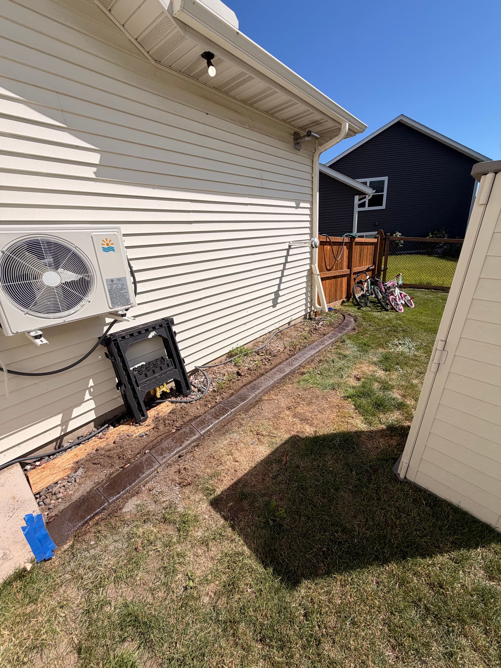 Gallery photos for Concrete Curbing in Walnut and Charcoal for Sauk Rapids Home: Image #3