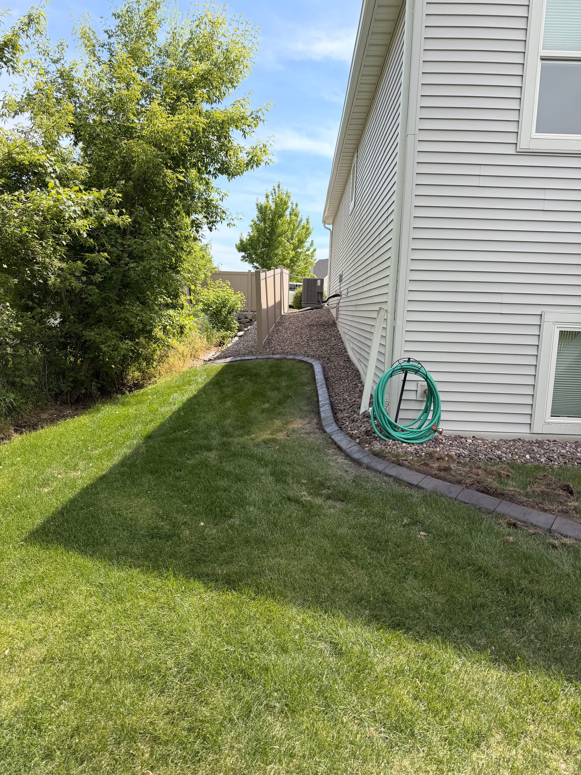 Gallery photos for Concrete Curbing Upgrade Gives St. Michael Home Sharp, Clean Edges: Image #3