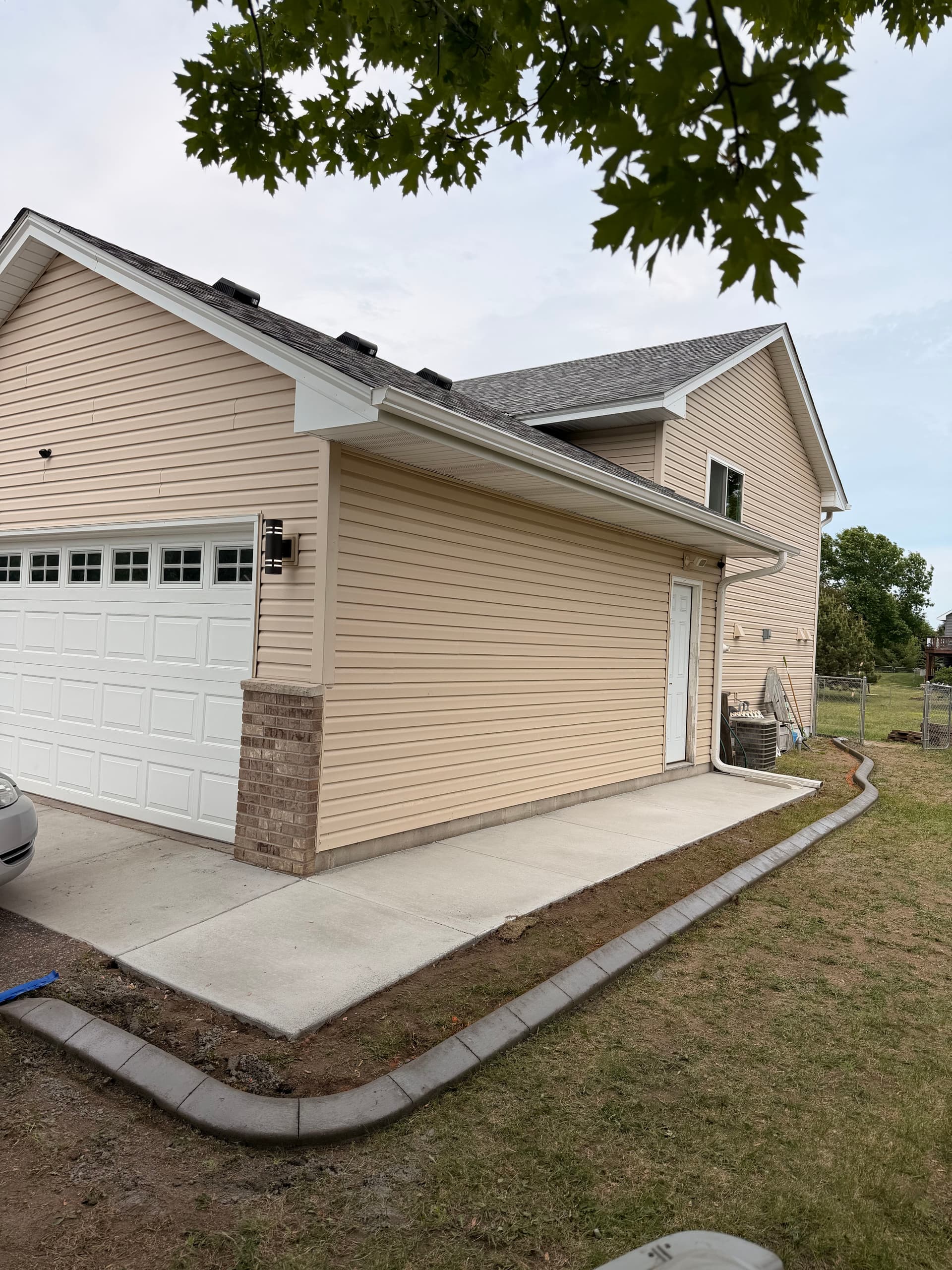 Gallery photos for Natural Concrete Curbing Gives Big Lake Home a Crisp Edge: Image #3