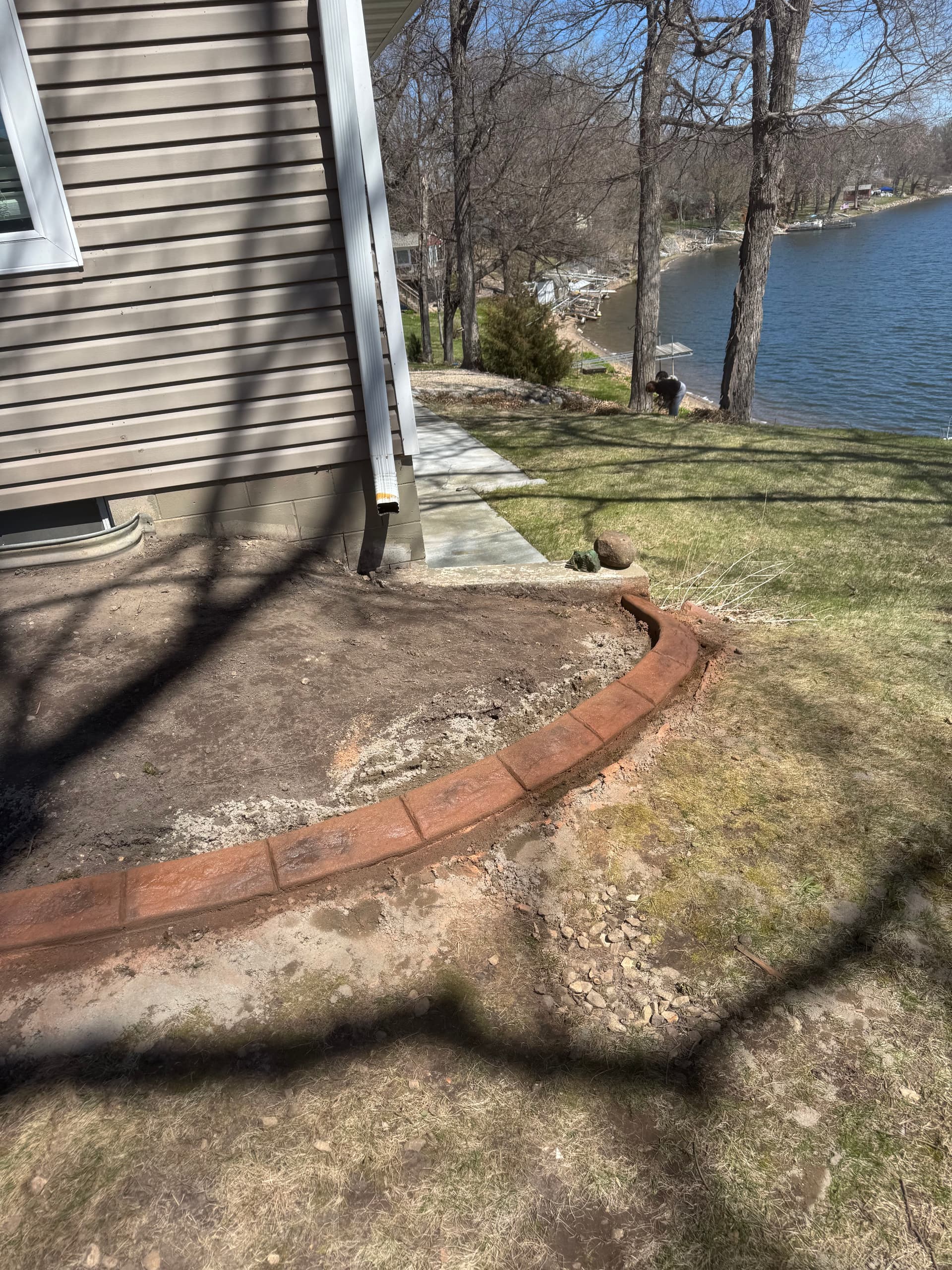 Gallery photos for Concrete Curbing with Terra Cotta and Walnut Blend in Buffalo MN: Image #2