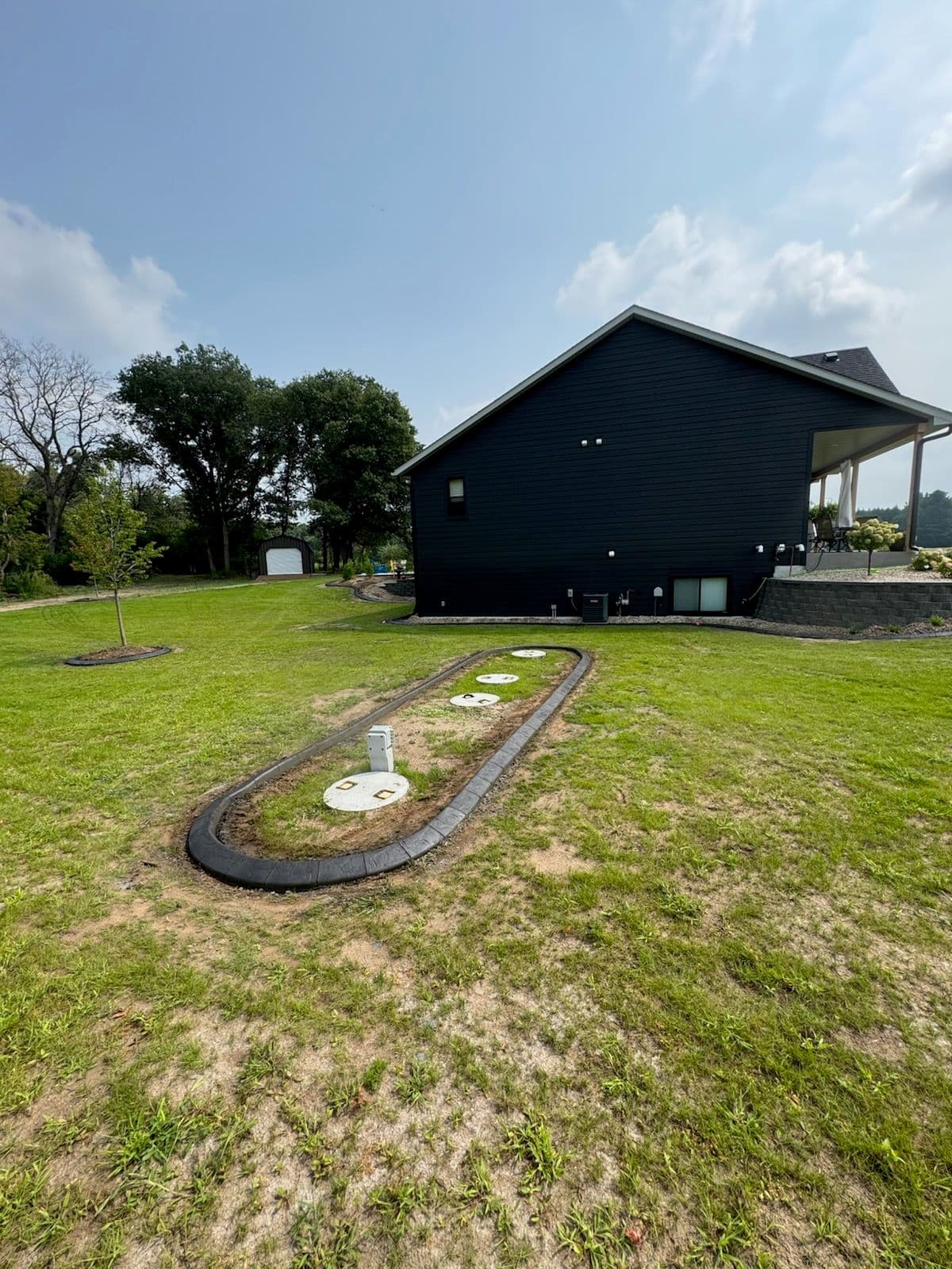 Modern Slate Roller Edging Enhances New Home image