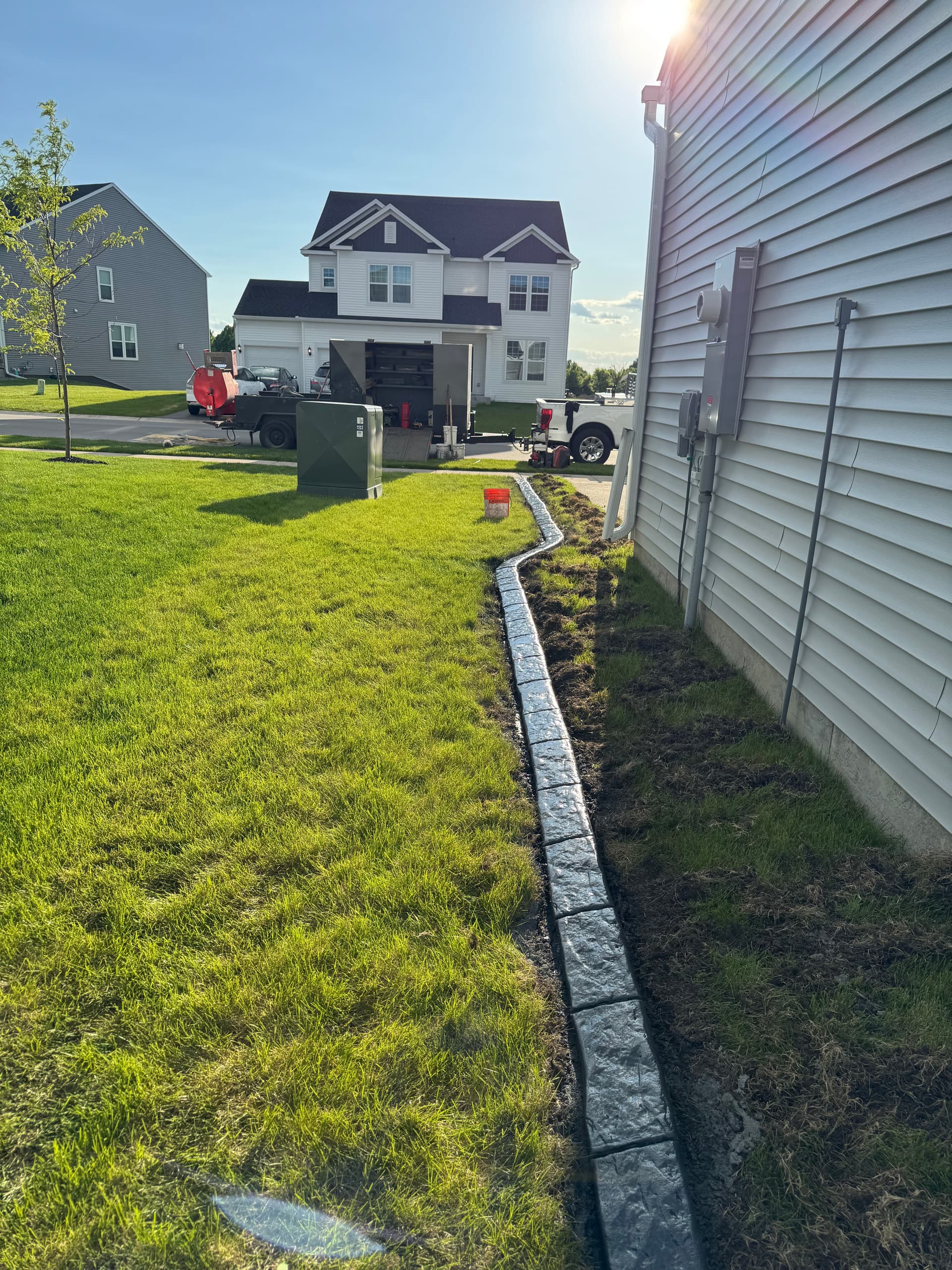 Gallery photos for Charcoal Concrete Curbing with Spanish Stamp in Rogers: Image #2