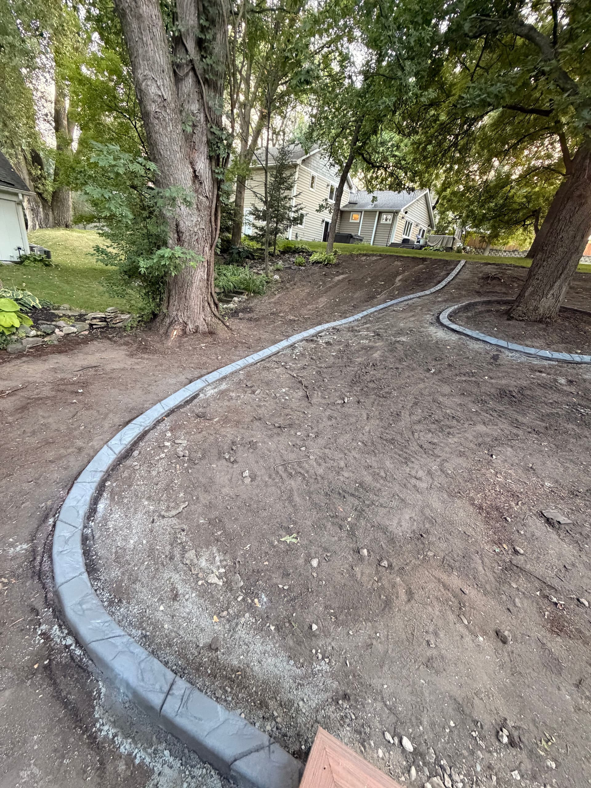 Gallery photos for Concrete Curbing Install Gives Edina Yard Sharp, Lasting Definition: Image #9