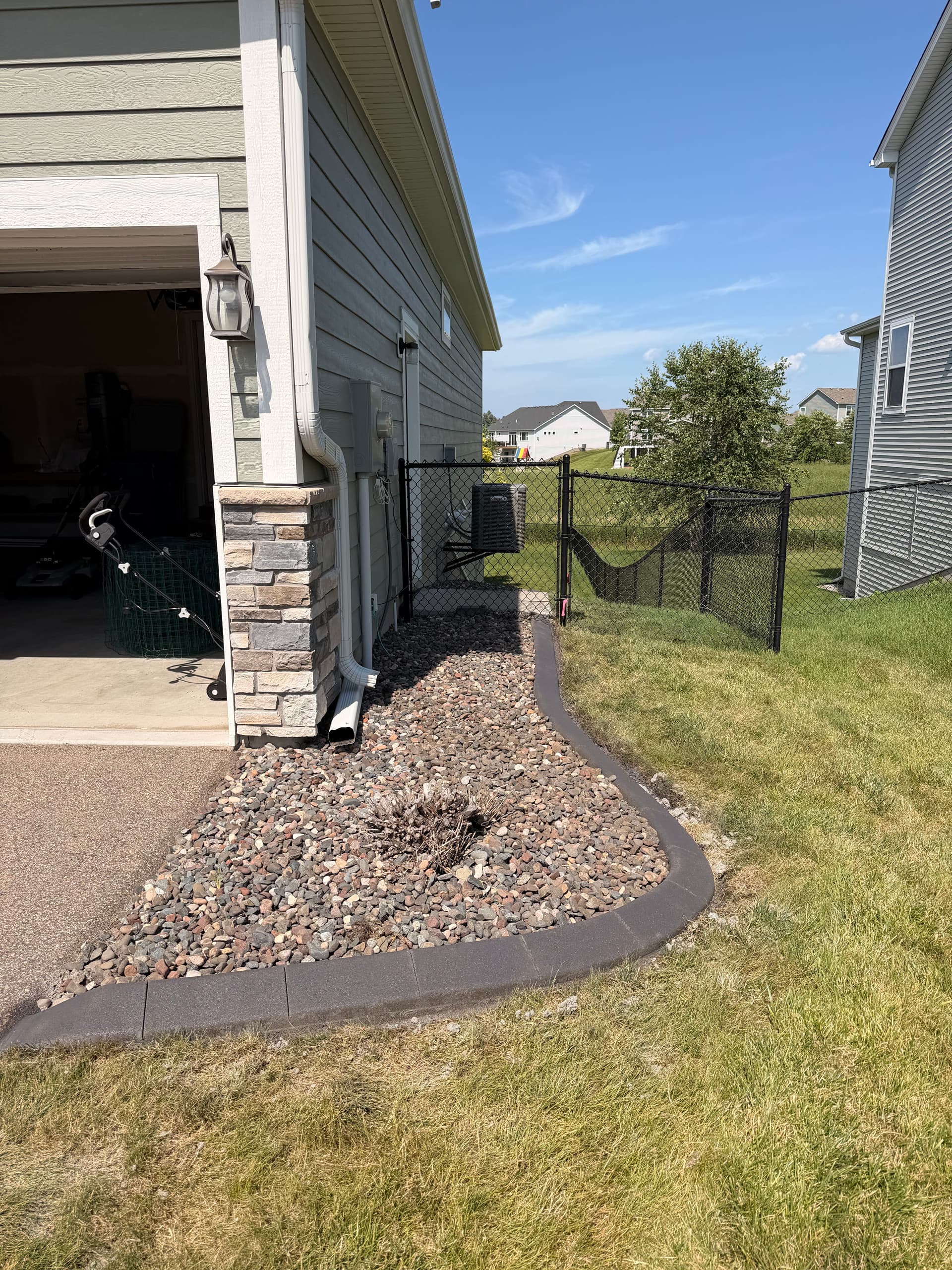 Gallery photos for Charcoal Concrete Curbing Gives Maple Grove Home Sharp Edges: Image #3