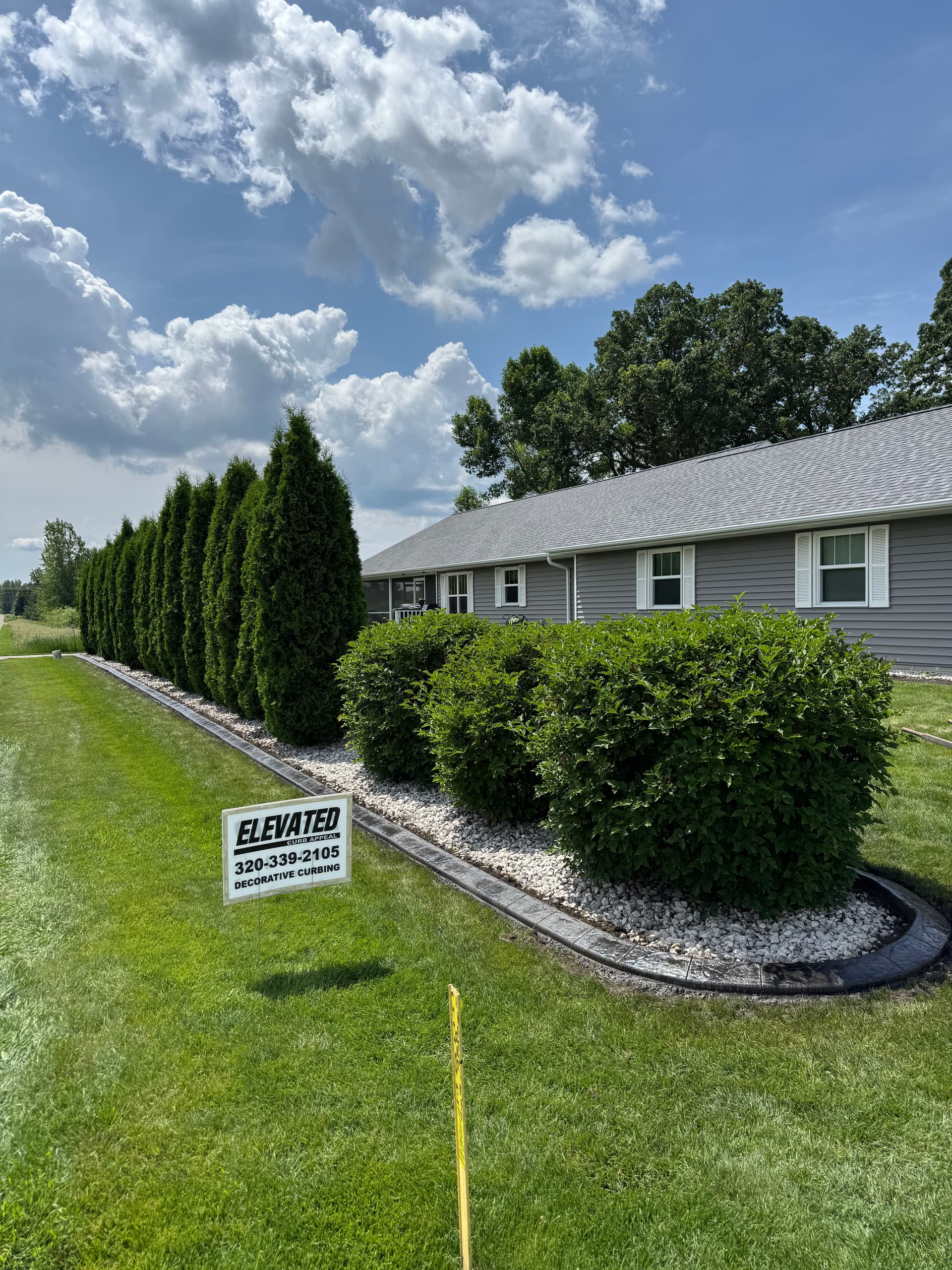 Concrete Curbing with Charcoal Finish and Spanish Stamp in Sartell image