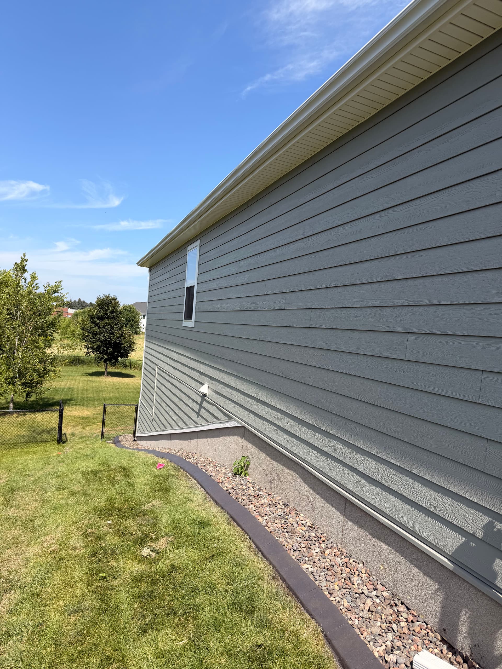 Gallery photos for Charcoal Concrete Curbing Gives Maple Grove Home Sharp Edges: Image #2