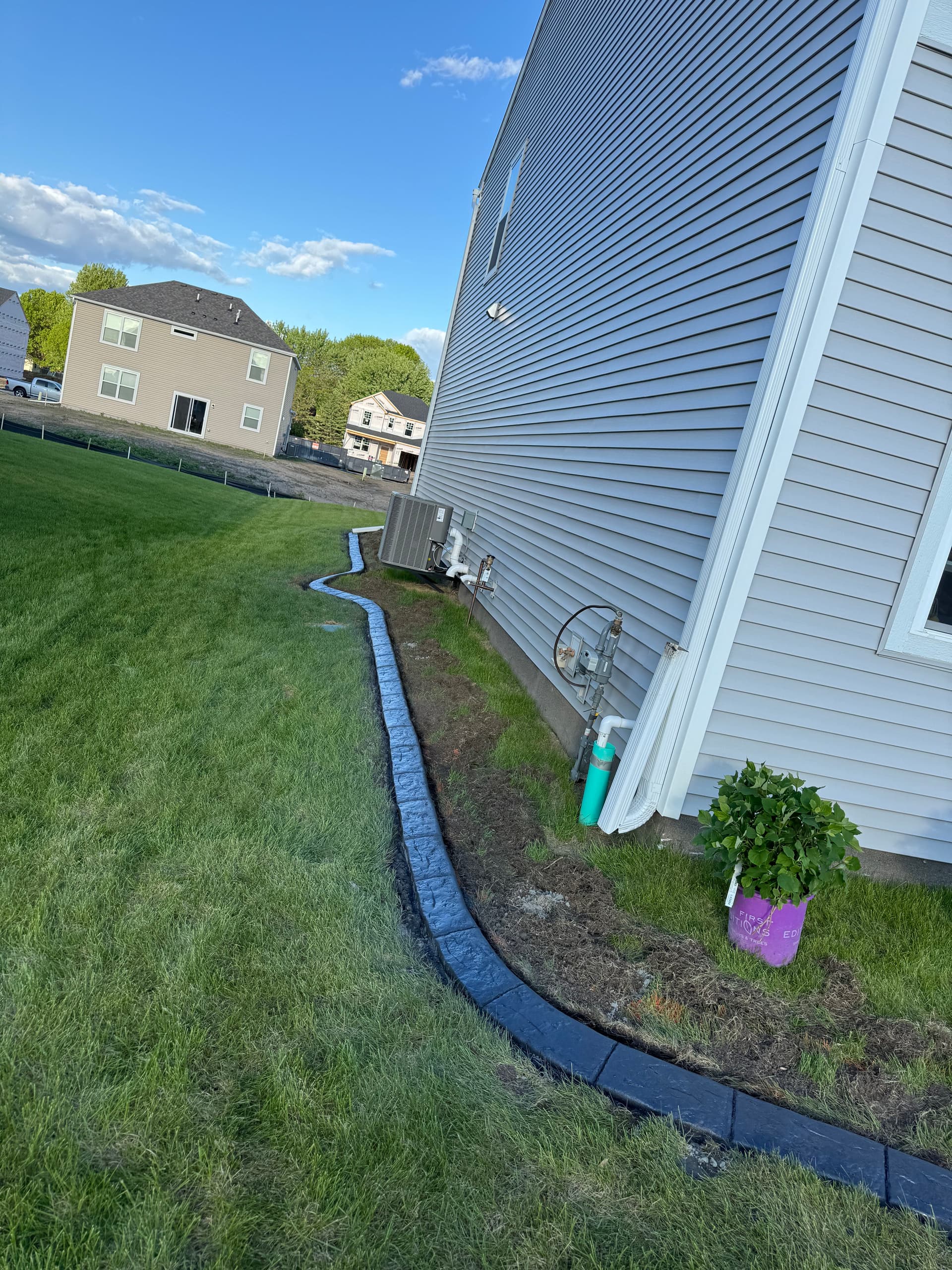 Gallery photos for Charcoal Concrete Curbing with Spanish Stamp in Rogers: Image #1