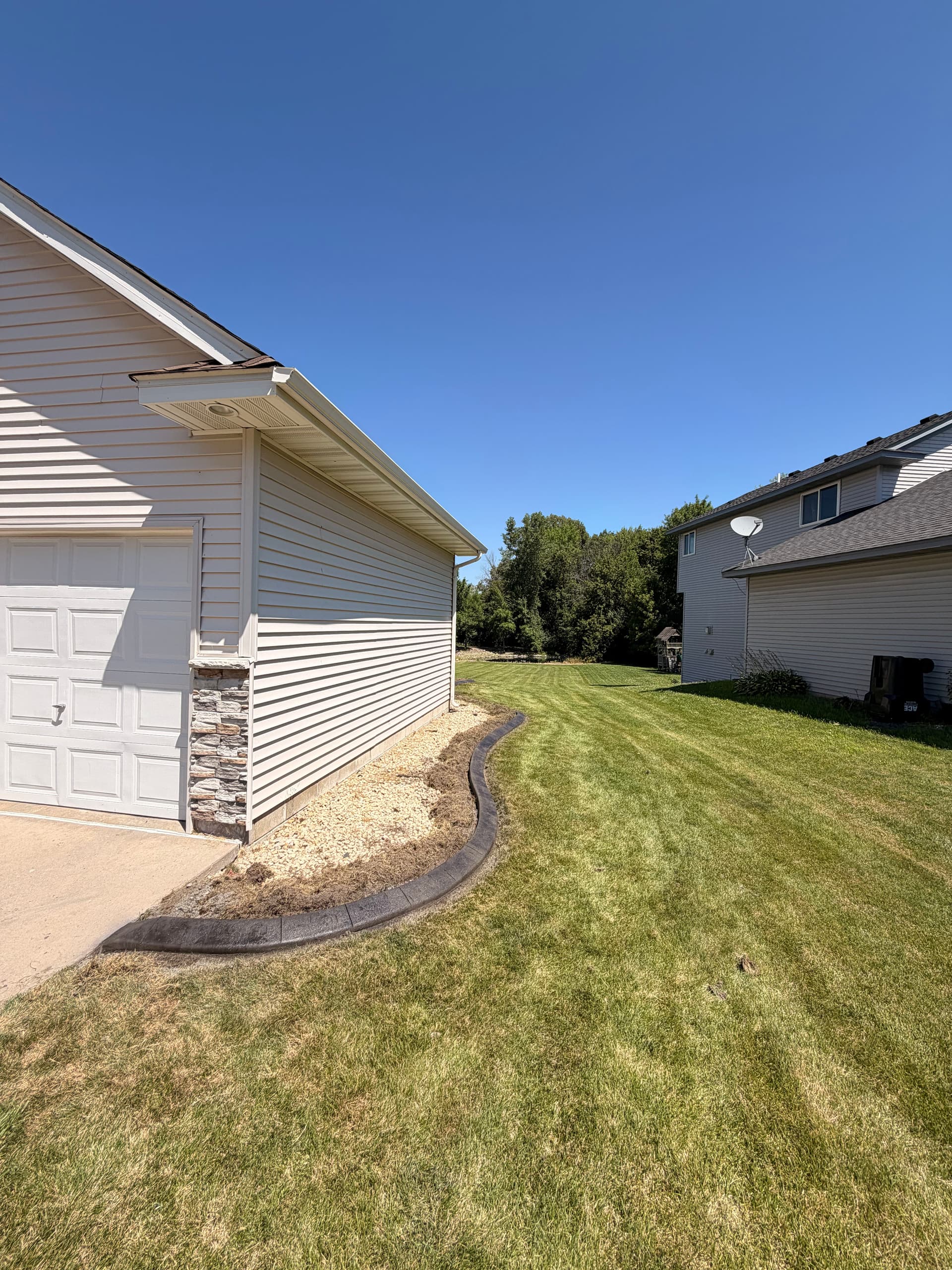 Gallery photos for Slate-Stamped Concrete Curbing with Charcoal Finish in Albertville: Image #1