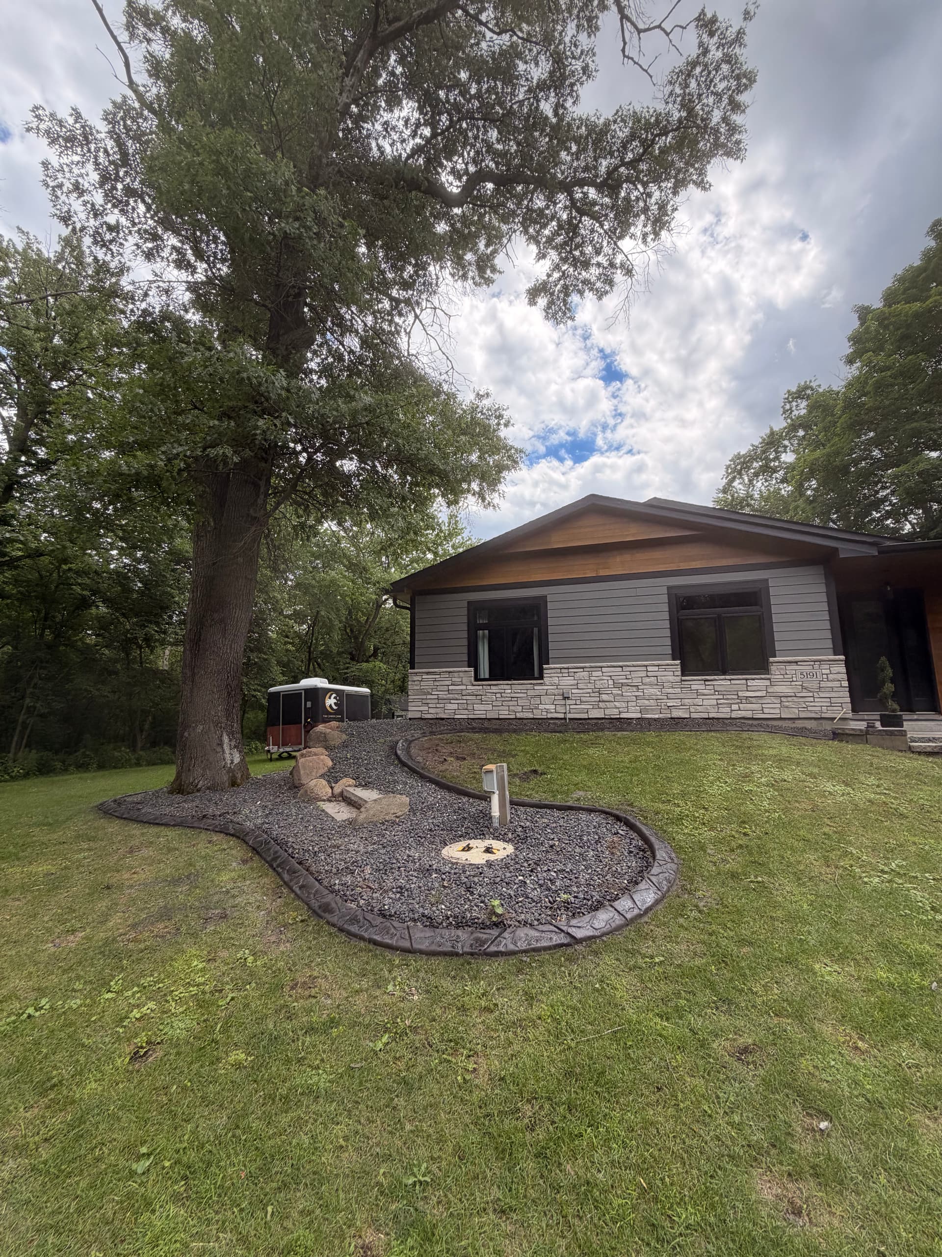 Concrete Curbing Gives This Andover Home Sharp, Clean Edges image