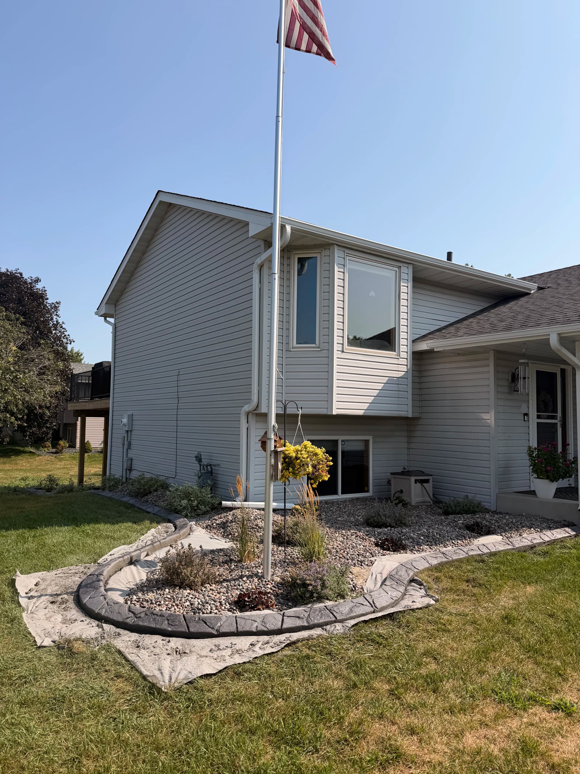 Concrete Curbing Gives Hugo MN Home Sharp, Low-Maintenance Borders image